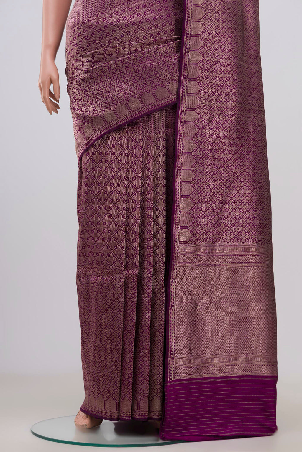 Pleats and pallu of Purple Banarasi Katan Silk Saree with Zari Brocade on the body and Zari Border. 