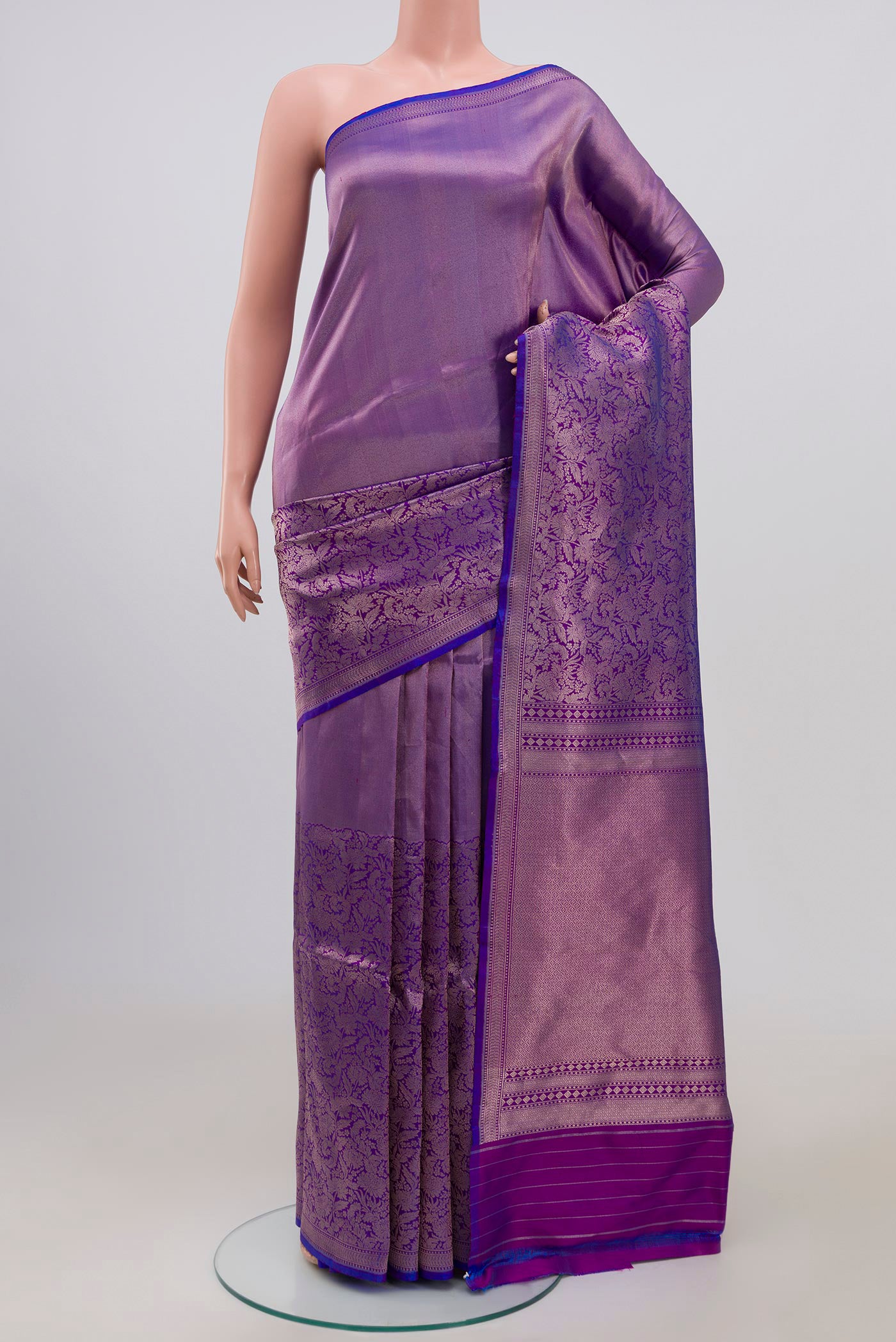 Blue Banarasi Katan Silk Saree with Zari Brocade on the body and Thin Zari Line.  displayed on a mannequin