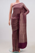 Purple Banarasi Katan Silk Saree with Zari Brocade on the body and Zari Border.  displayed on a mannequin