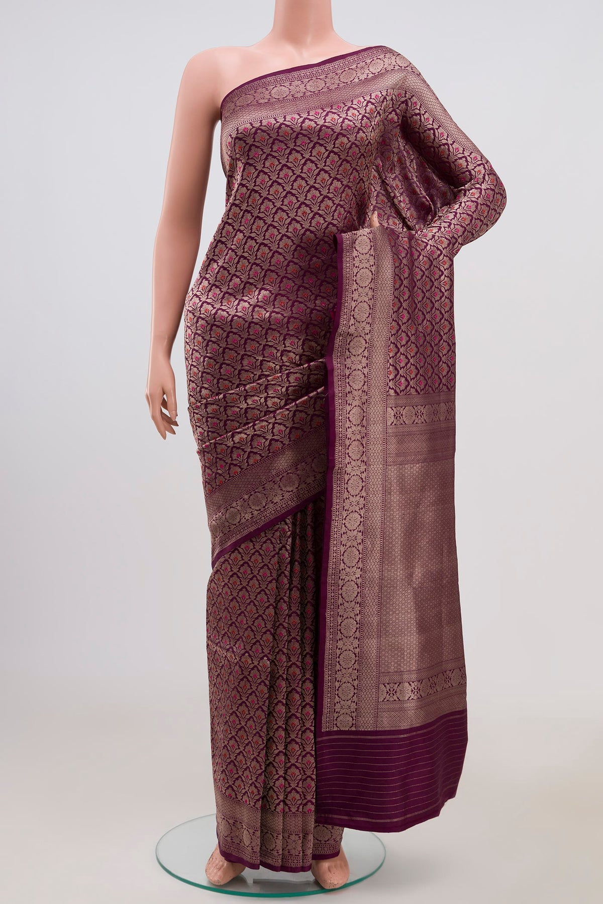 Purple Banarasi Katan Silk Saree with Zari Brocade on the body and Zari Border.  displayed on a mannequin