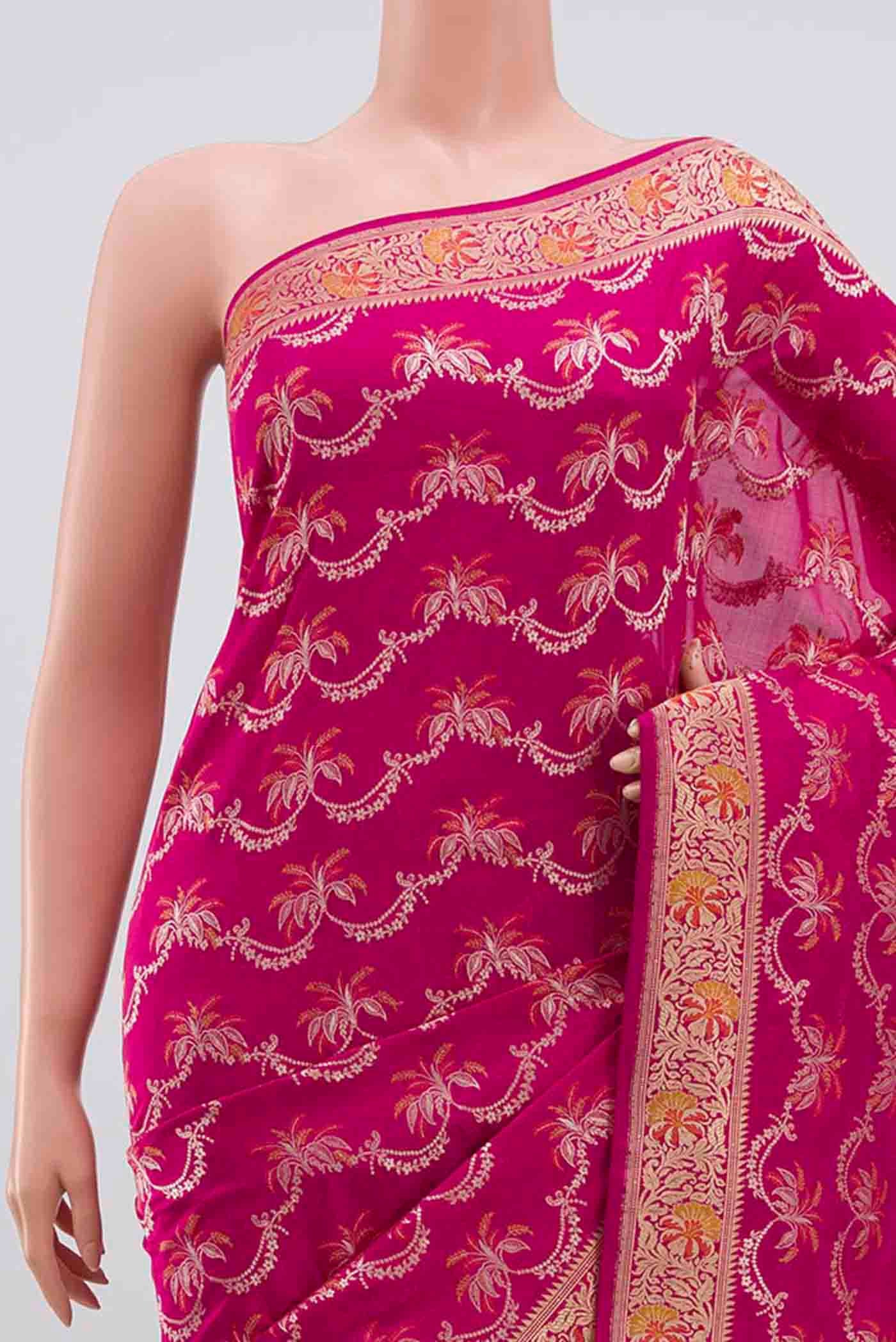 Border image of Rani Pink Banarasi Silk Saree with Zari Brocade on the body and Zari Border. 