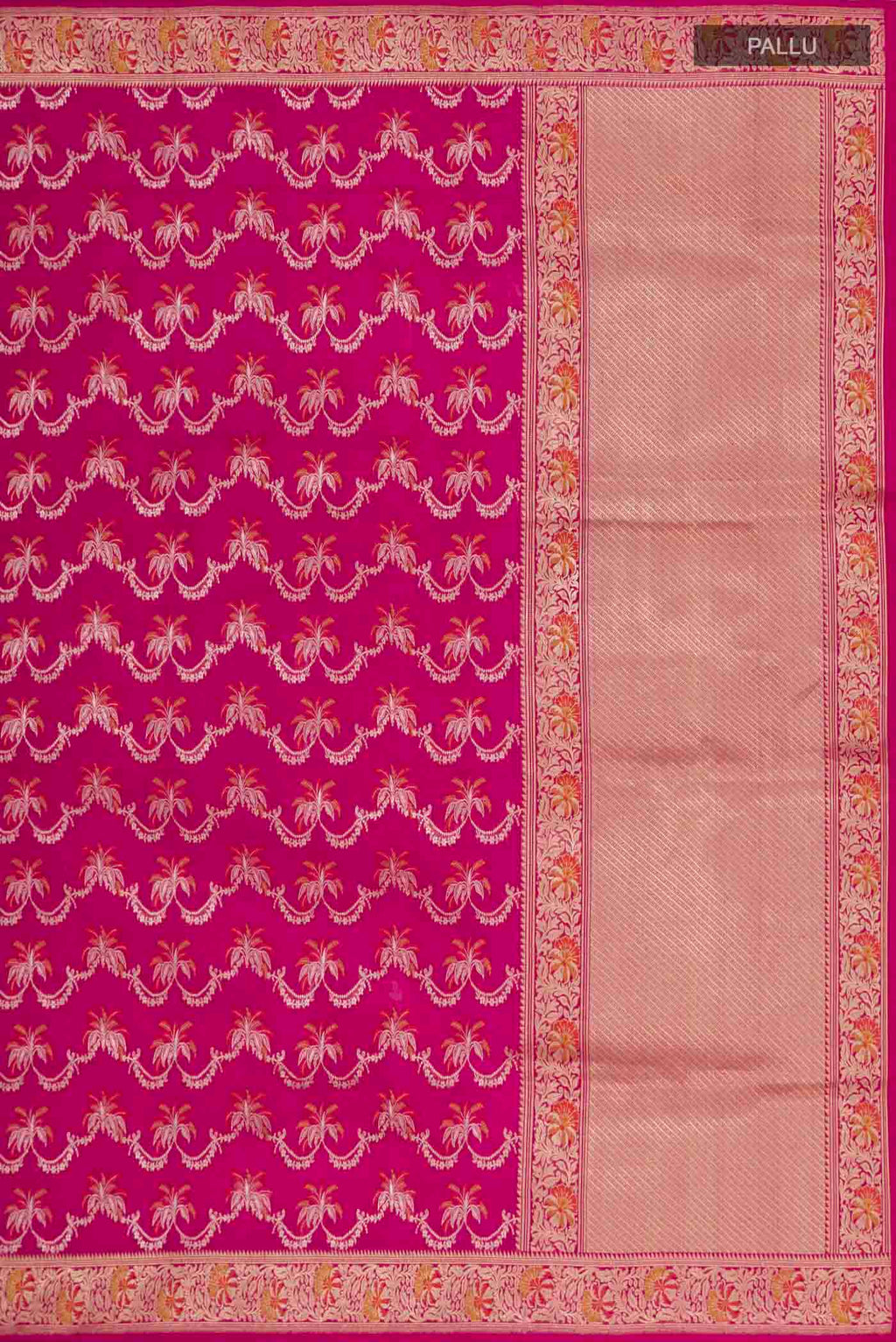 Close up image of the pallu of Rani Pink Banarasi Silk Saree with Zari Brocade on the body and Zari Border. 