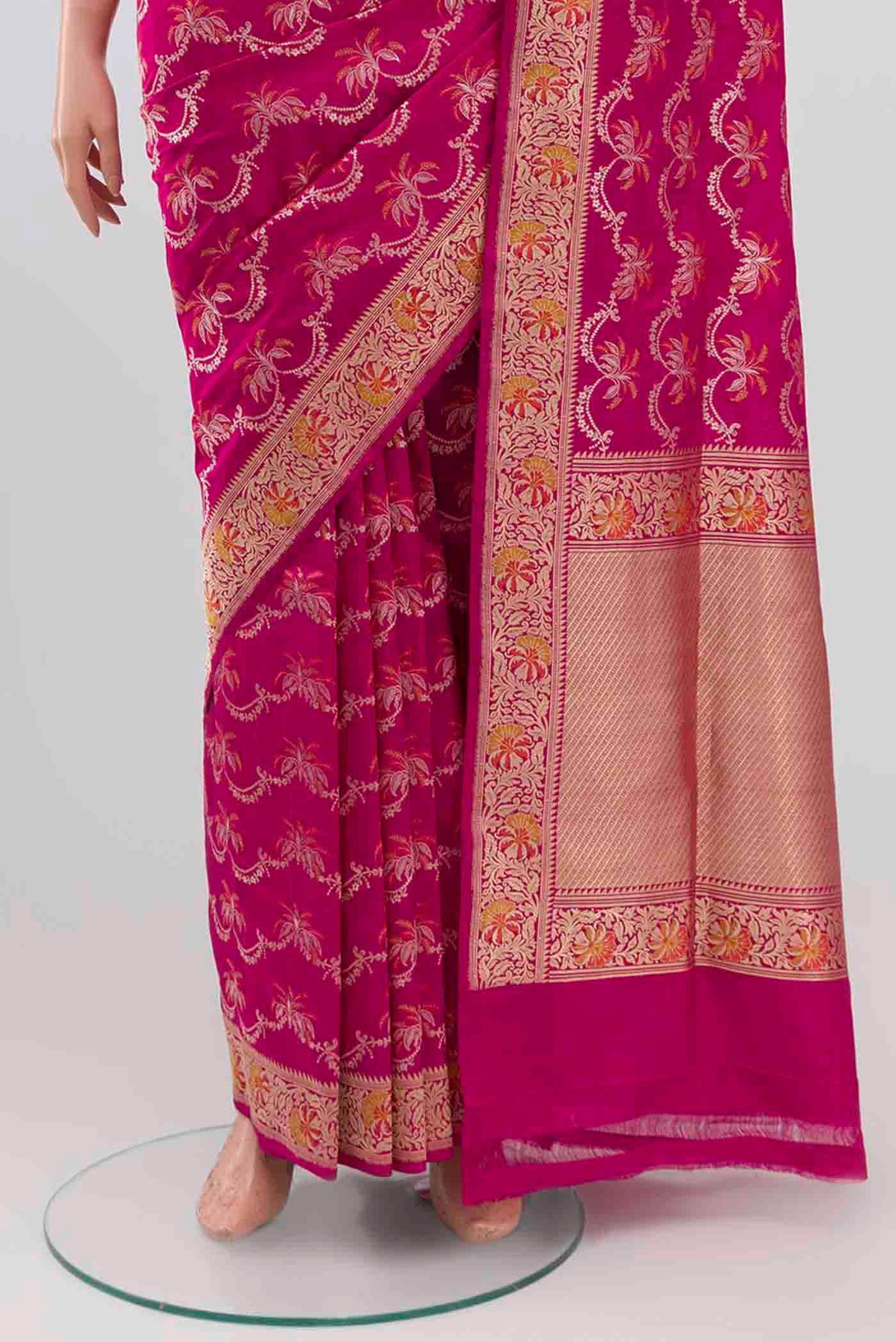 Pleats and pallu of Rani Pink Banarasi Silk Saree with Zari Brocade on the body and Zari Border. 