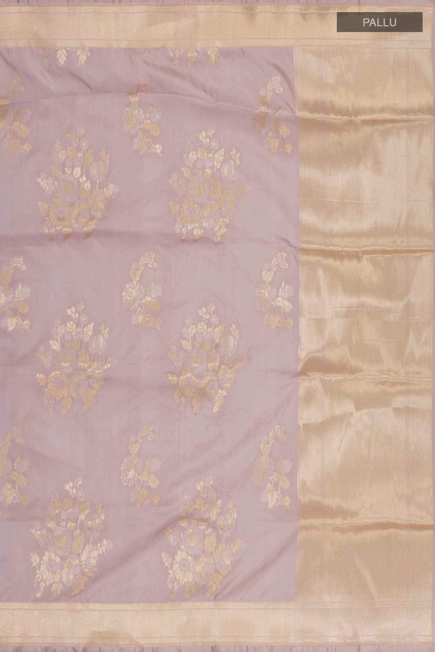 Close up image of the pallu of Lavender Banarasi Silk Saree with Zari Butta on the body and Zari Border. 