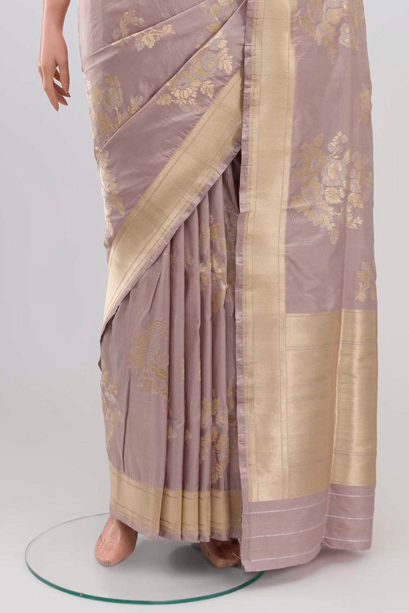 Pleats and pallu of Lavender Banarasi Silk Saree with Zari Butta on the body and Zari Border. 