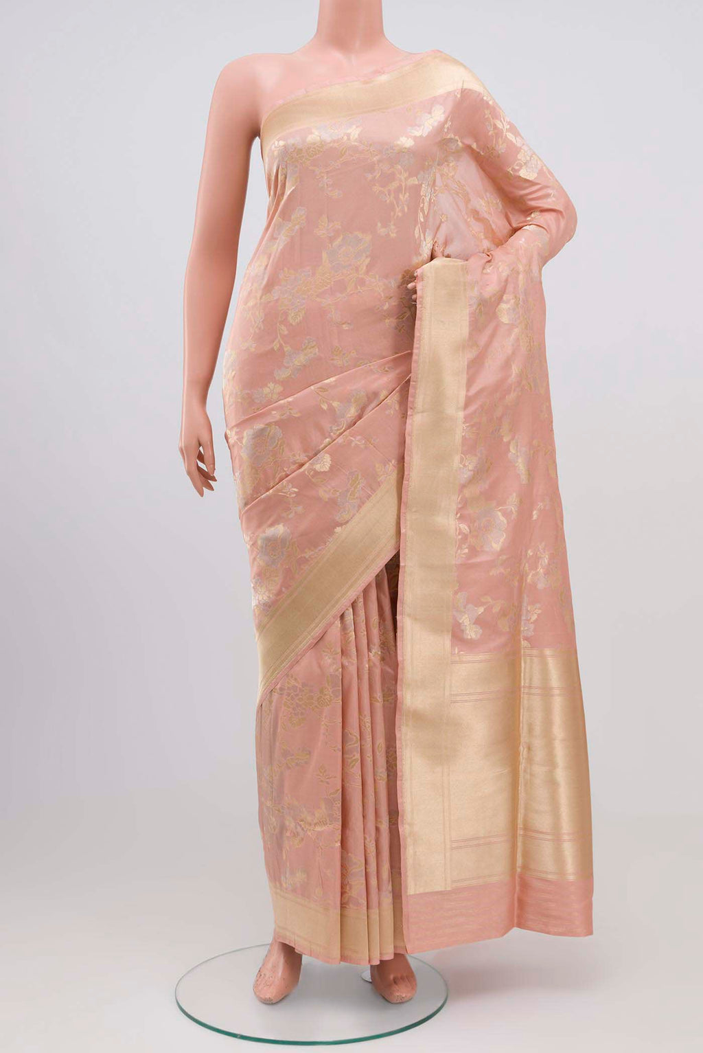 Peach Banarasi Silk Saree with Zari Brocade on the body and Zari Border.  displayed on a mannequin