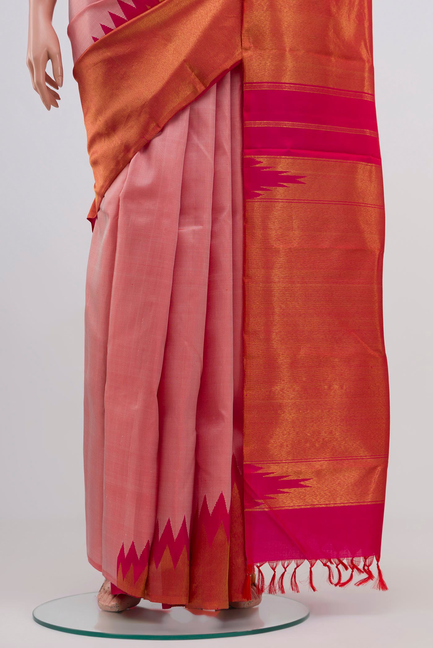 Pleats and pallu of Golden Peach Kanjivaram Silk Saree with Half And Half on the body and Without Border. 