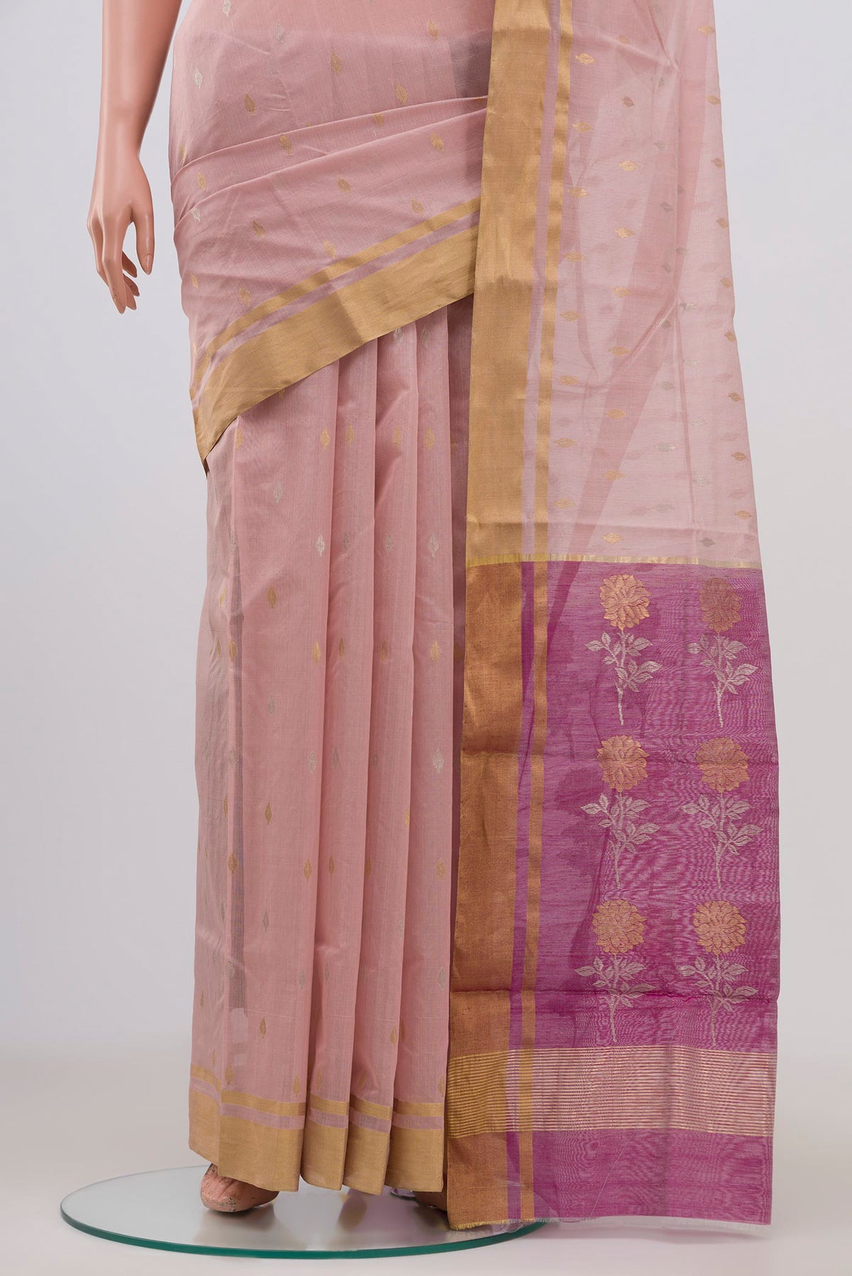 Pleats and pallu of Peach Chanderi Silk Cotton Saree with Zari Butta on the body and Zari Border. 