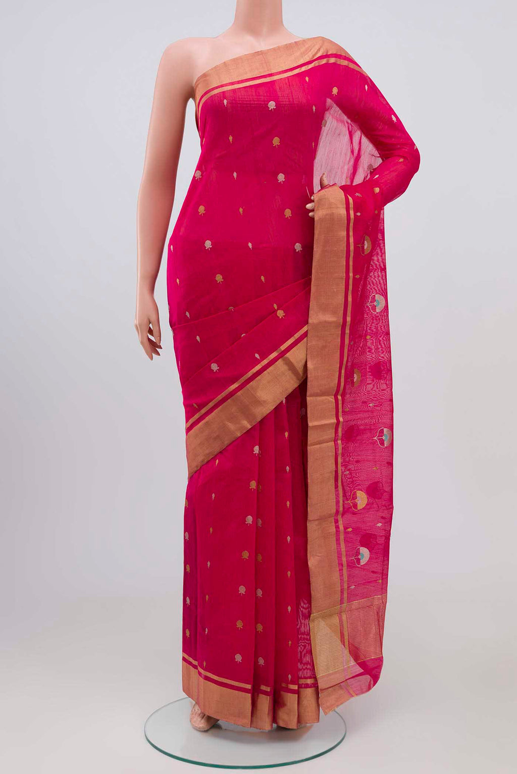 Dark Pink Chanderi Silk Cotton Saree with Zari Butta on the body and Zari Border.  displayed on a mannequin