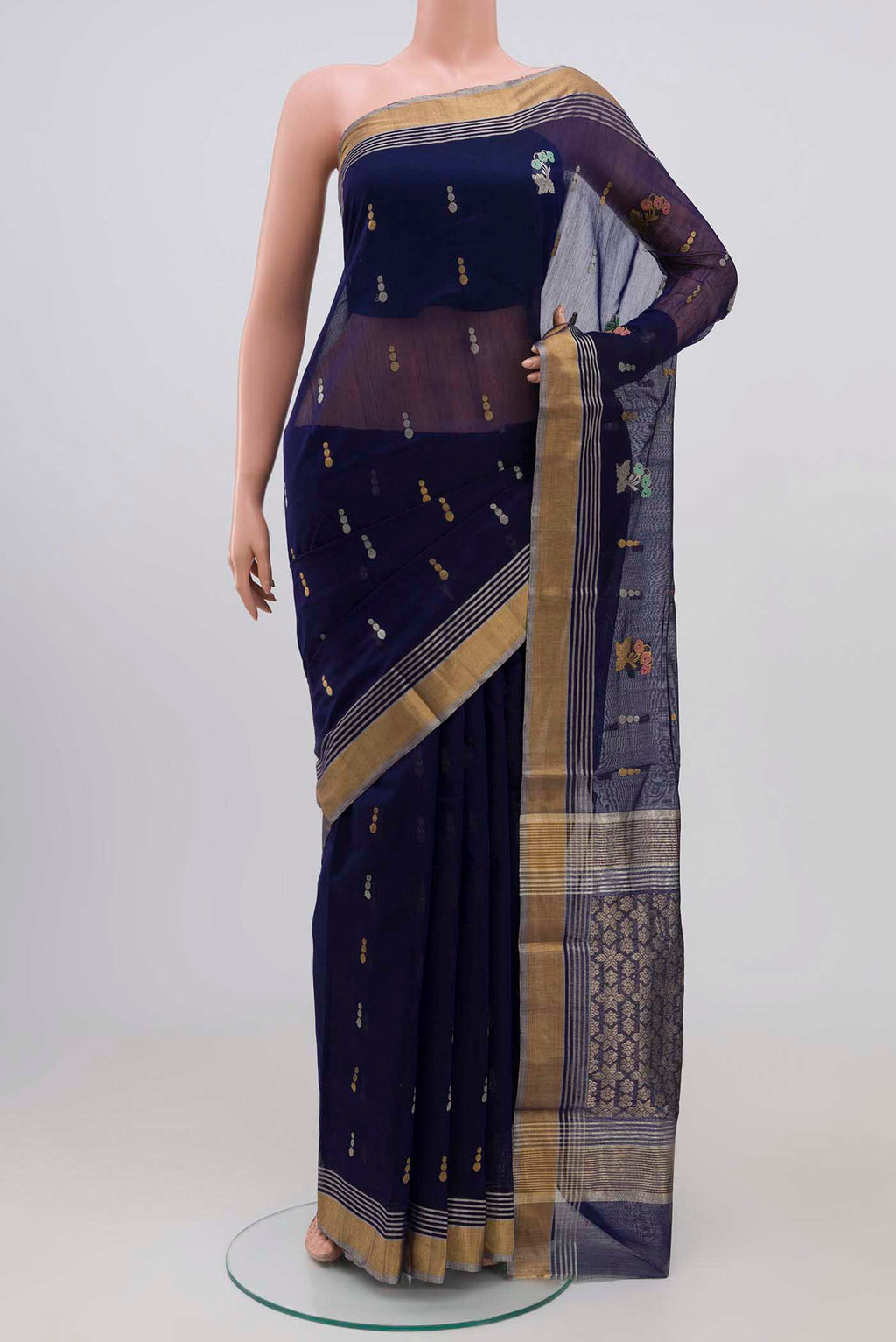 Dark Blue Chanderi Silk Cotton Saree with Zari Butta on the body and Zari Border.  displayed on a mannequin