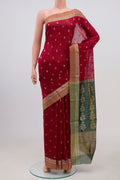Maroon Chanderi Silk Cotton Saree with Zari Butta on the body and Zari Border.  displayed on a mannequin