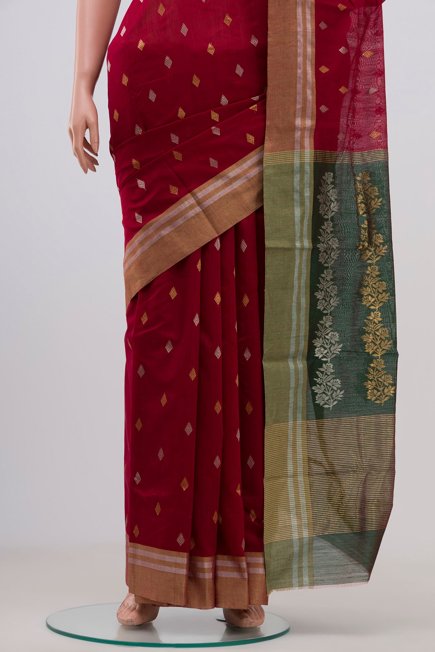 Pleats and pallu of Maroon Chanderi Silk Cotton Saree with Zari Butta on the body and Zari Border. 