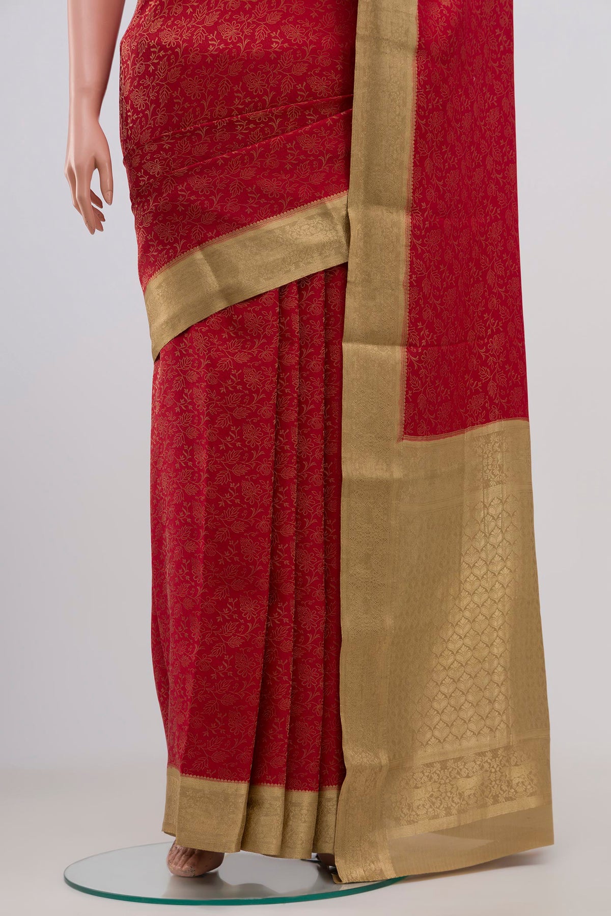Pleats and pallu of Red Mysore Crepe Saree with Zari Brocade on the body and Zari Border. 