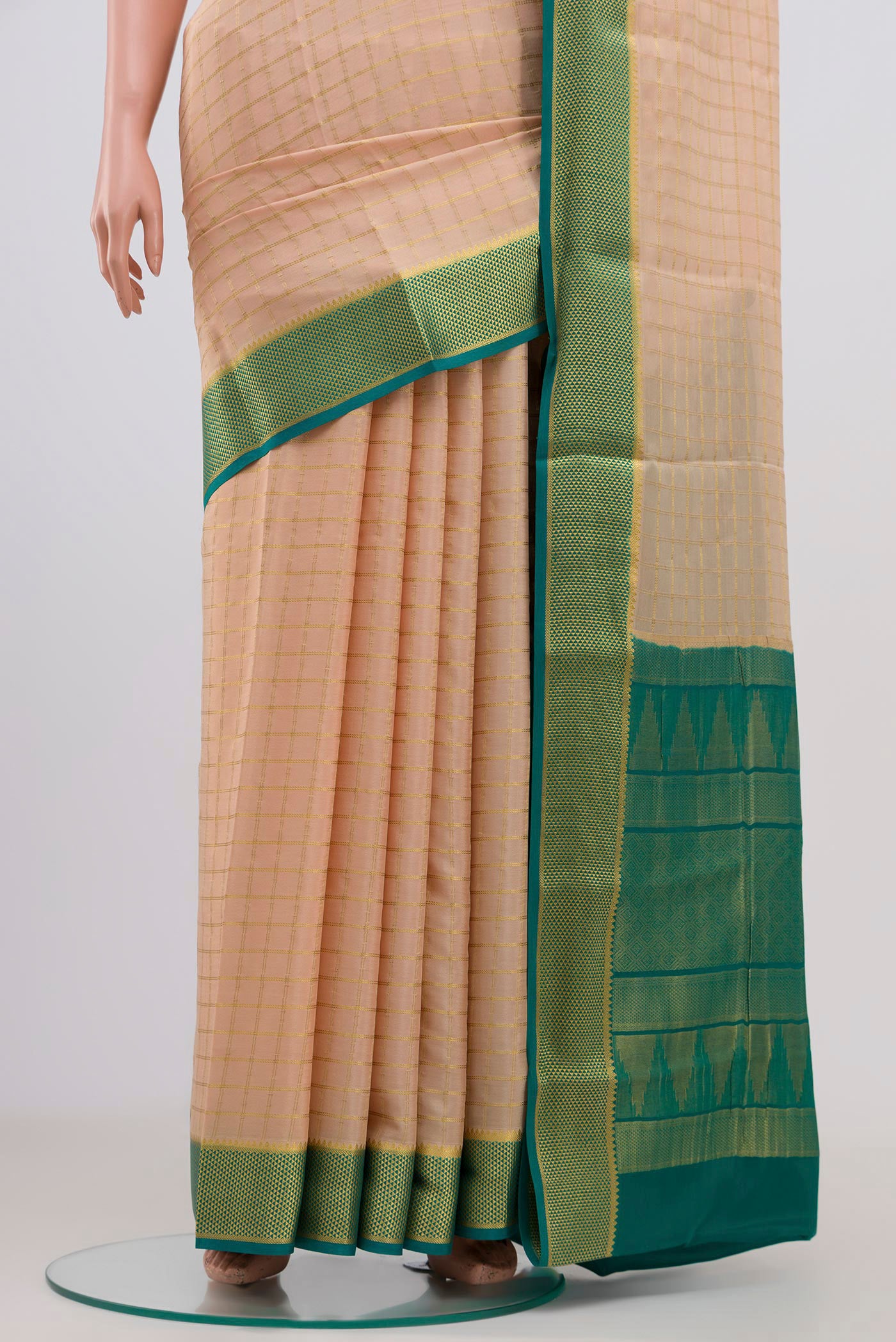 Pleats and pallu of Cream Mysore Crepe Saree with Checked design on the body and Zari Border. 