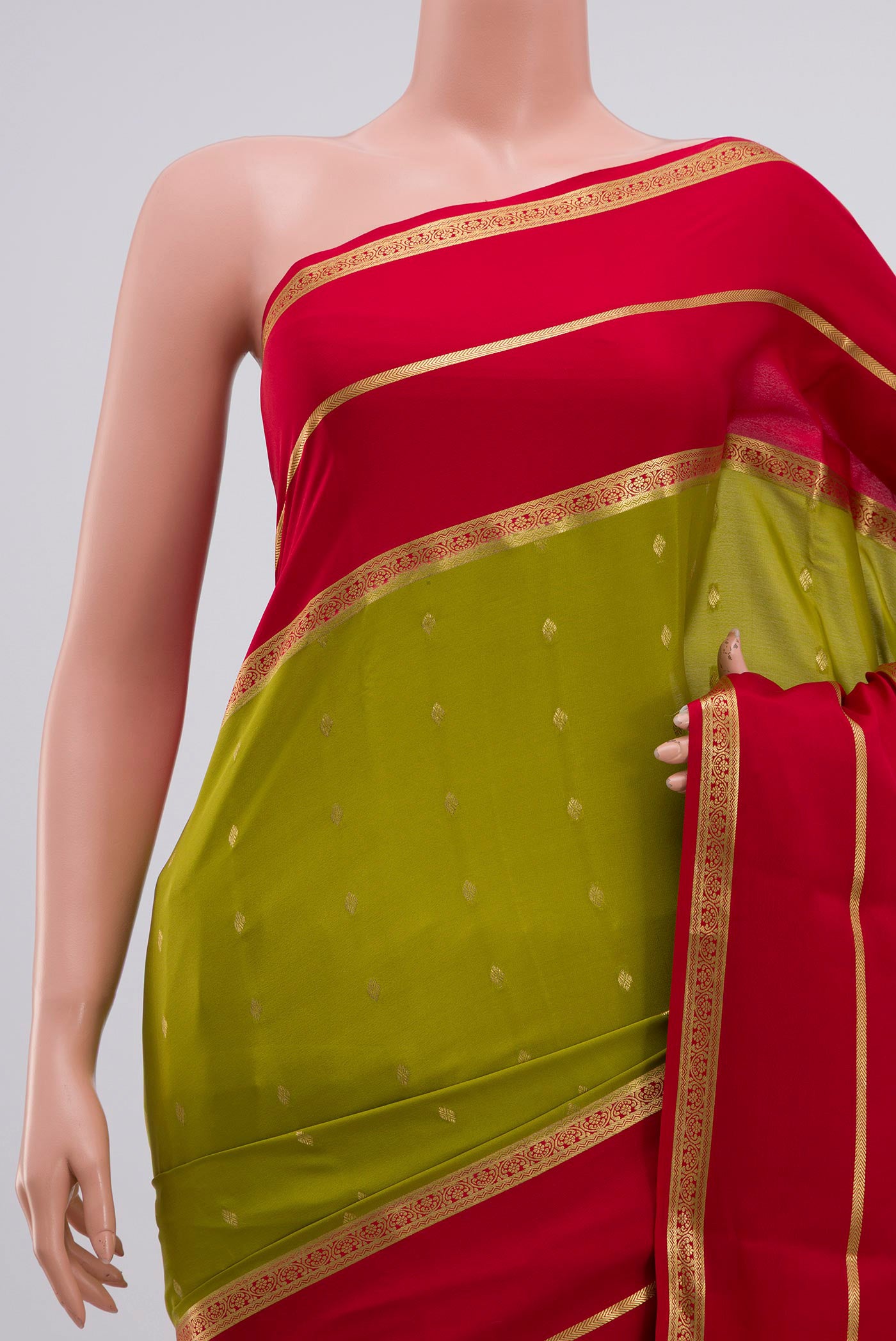 Border image of Olive Green Crepe Saree with Zari Butta on the body and Zari Border. 