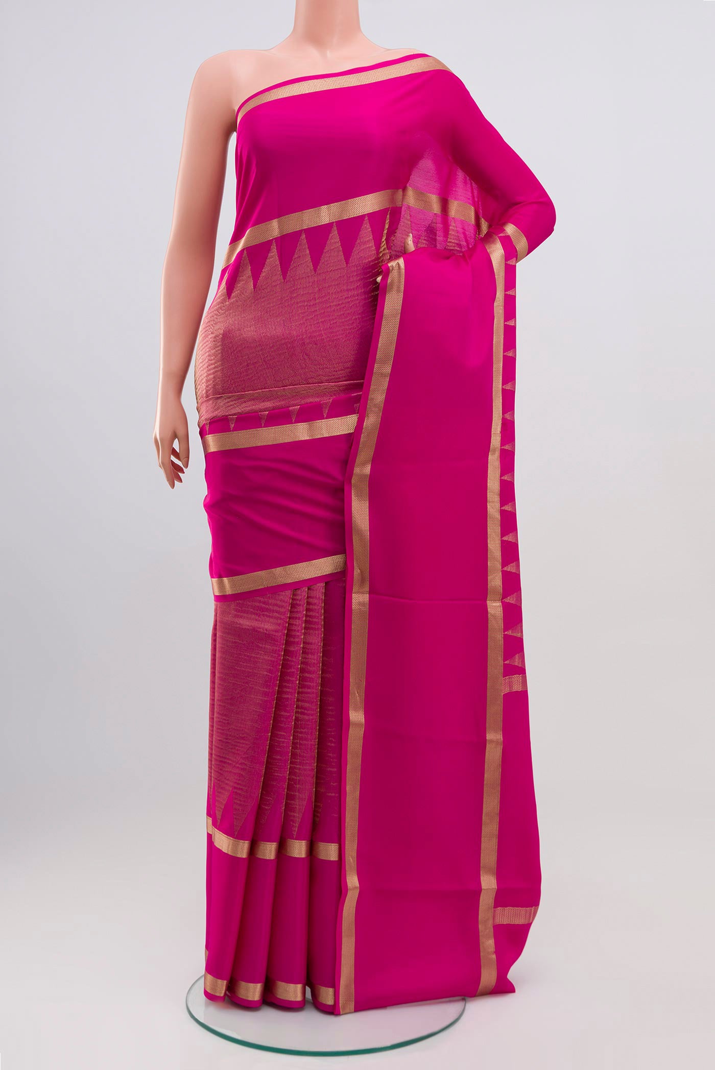 Pink Mysore Crepe Saree with Zari Brocade on the body and Zari Border.  displayed on a mannequin