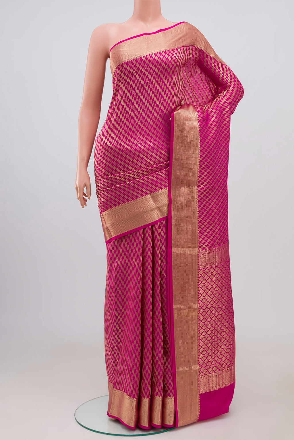 Pink Mysore Crepe Saree with Zari Brocade on the body and Zari Border.  displayed on a mannequin