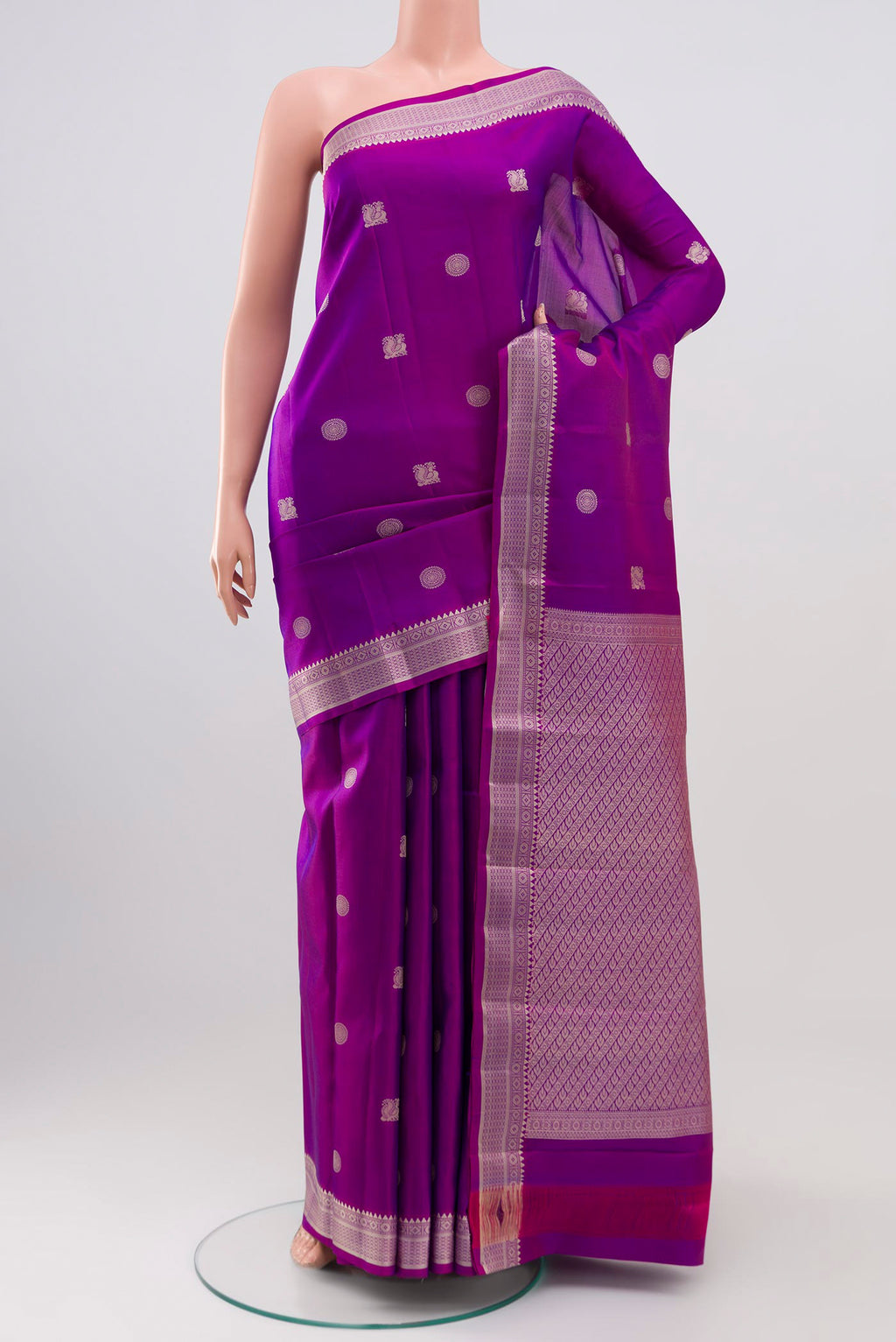 Purple Kanchipuram Silk Saree with Thread Butta on the body and Thread Border.  displayed on a mannequin