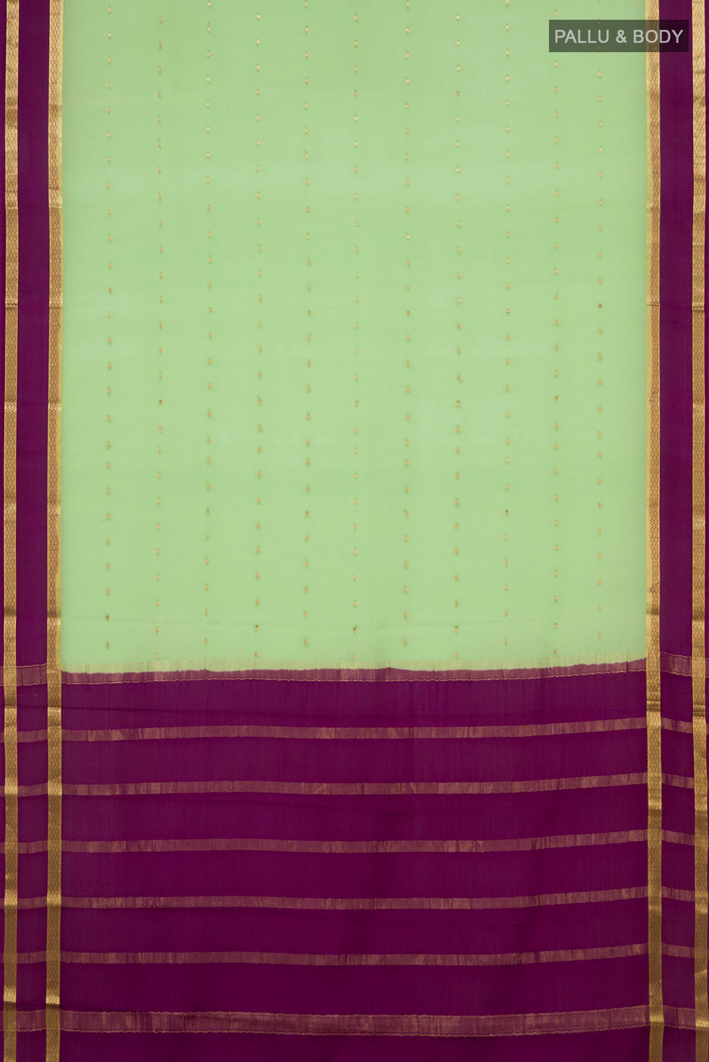 Flat view of Light Green Mysore Crepe Saree with Zari Butta on the body and Zari Border. 