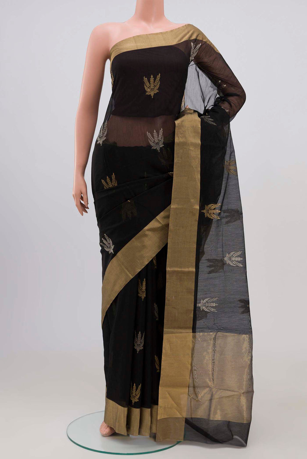 Black Chanderi Silk Cotton Saree with Zari Butta on the body and Zari Border.  displayed on a mannequin