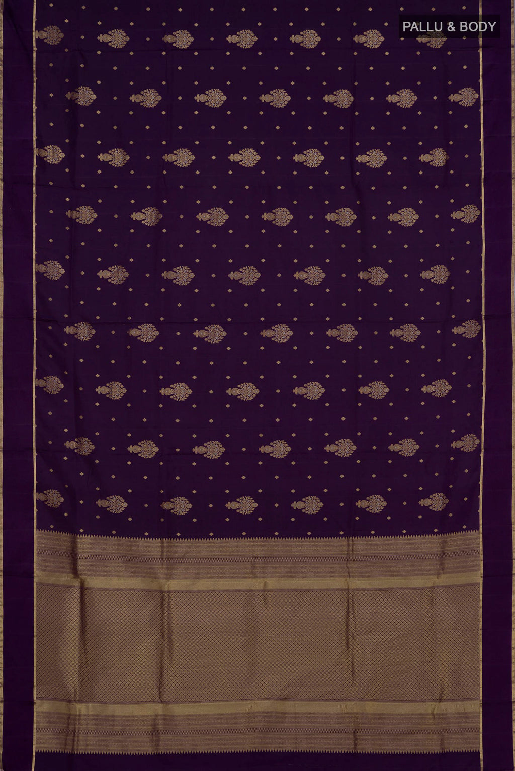 Flat view of Purple Soft Silk Saree with Zari Butta on the body and Thin Zari Line. 