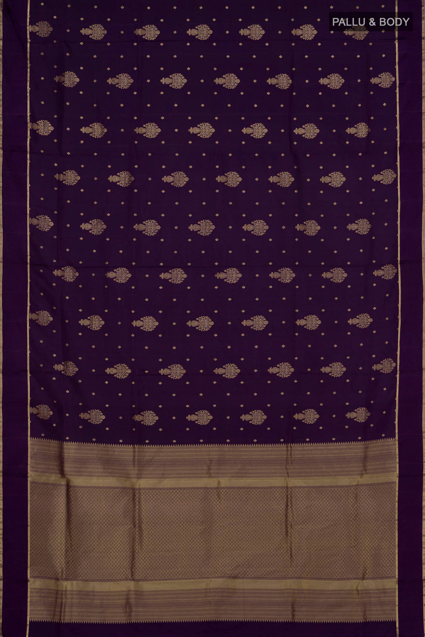 Flat view of Purple Soft Silk Saree with Zari Butta on the body and Thin Zari Line. 