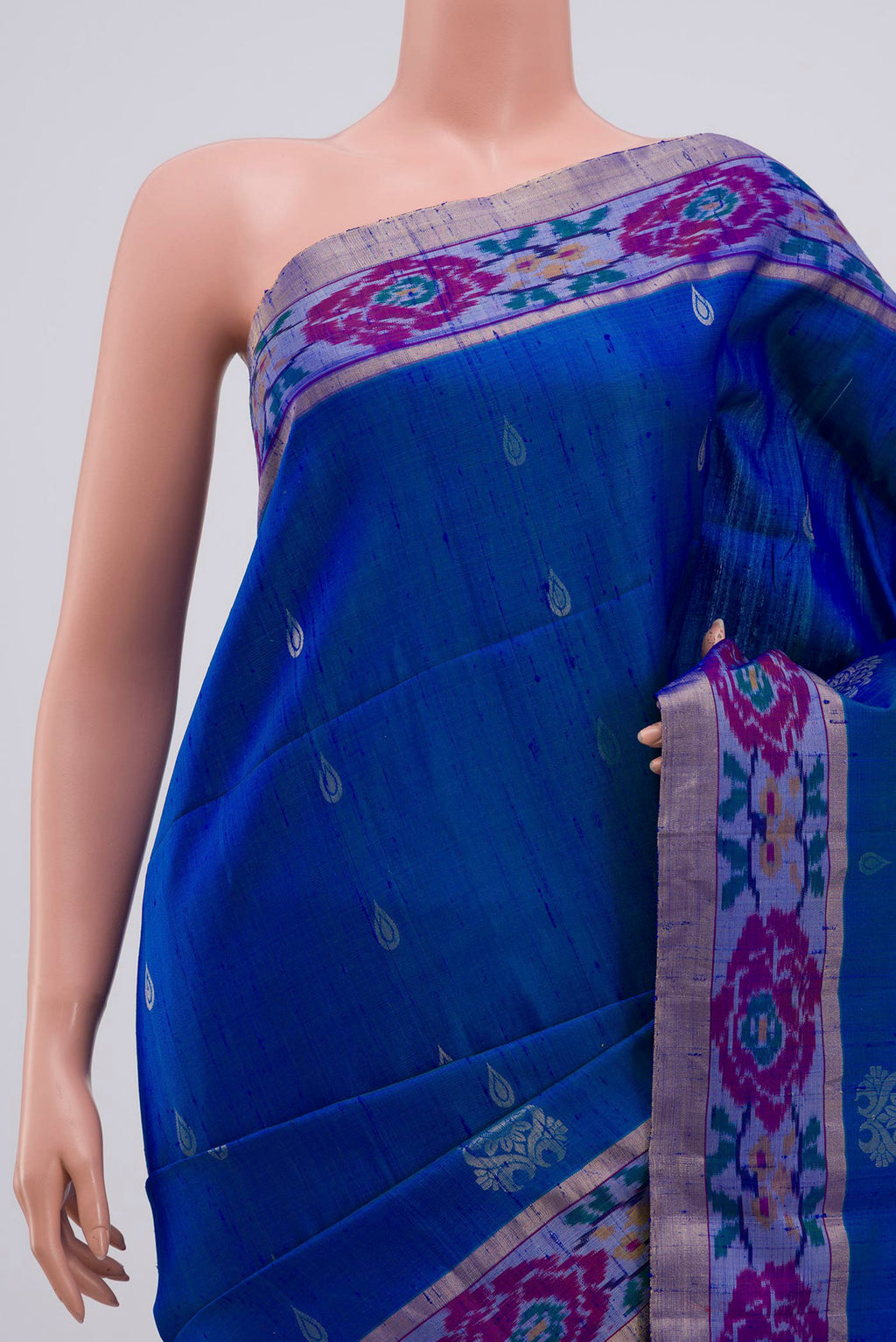 Border image of Blue Soft Silk Saree with Zari Butta on the body and Ikat Border. 
