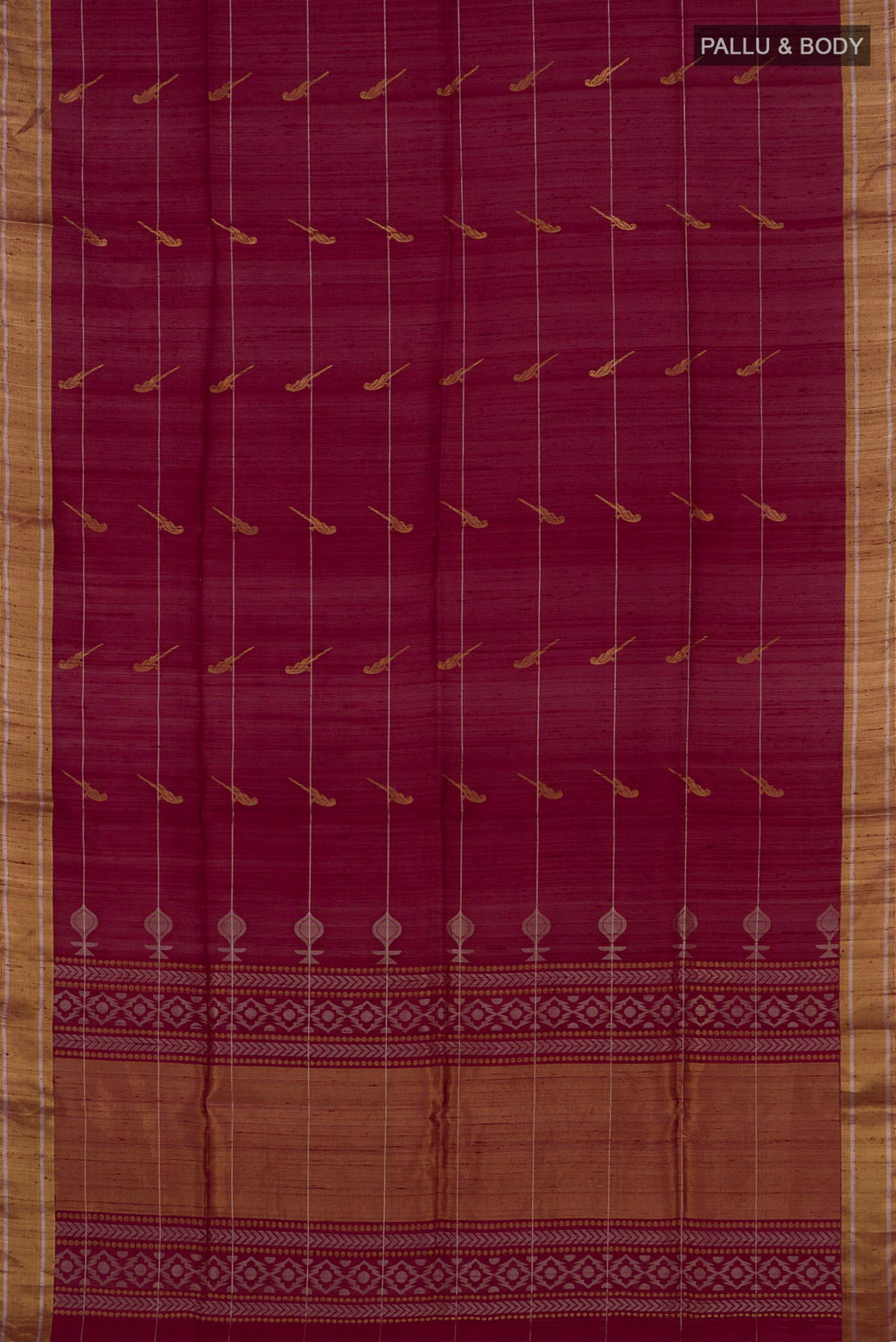 Flat view of Maroon Soft Silk Saree with Zari Butta on the body and Zari Border. 