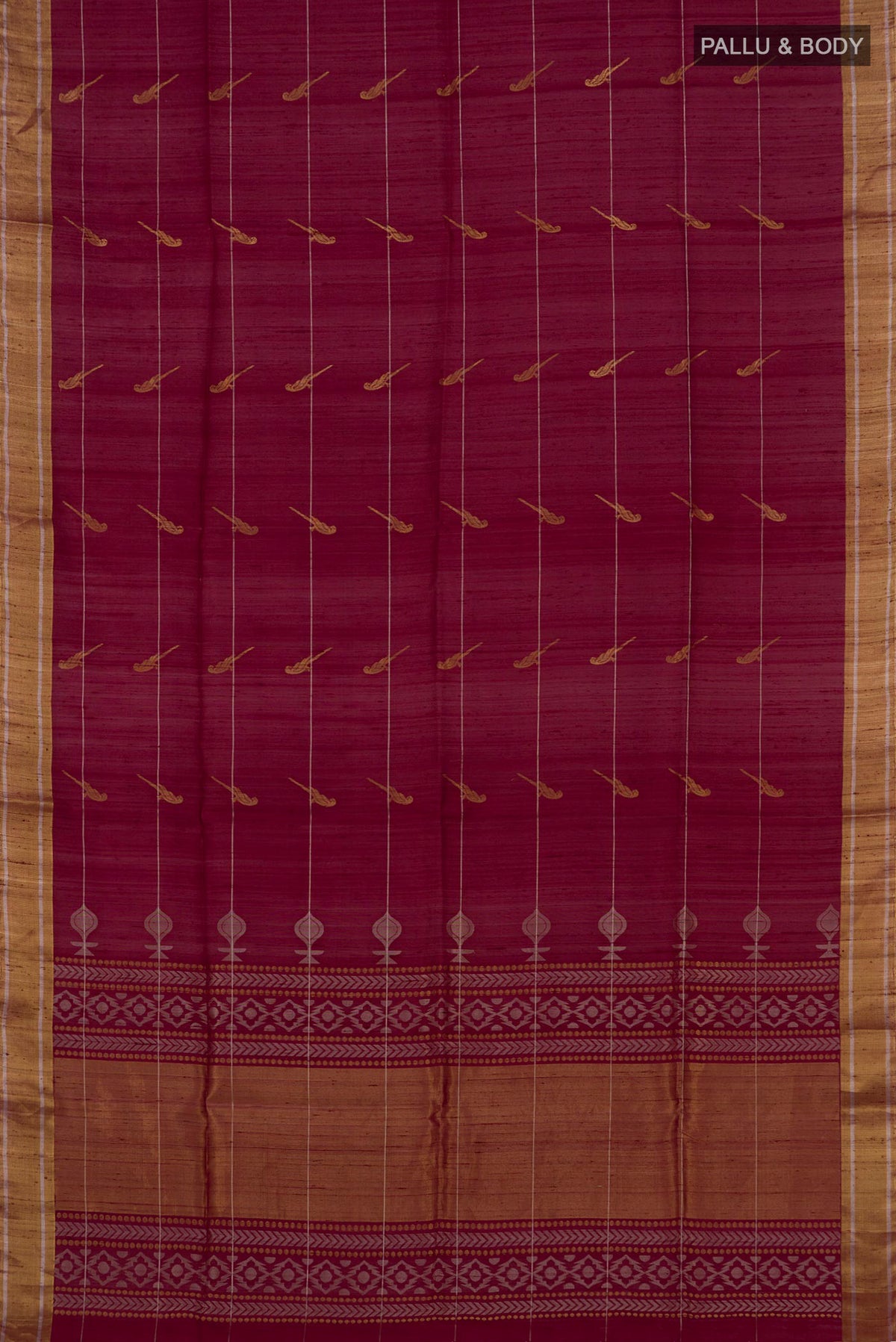 Flat view of Maroon Soft Silk Saree with Zari Butta on the body and Zari Border. 
