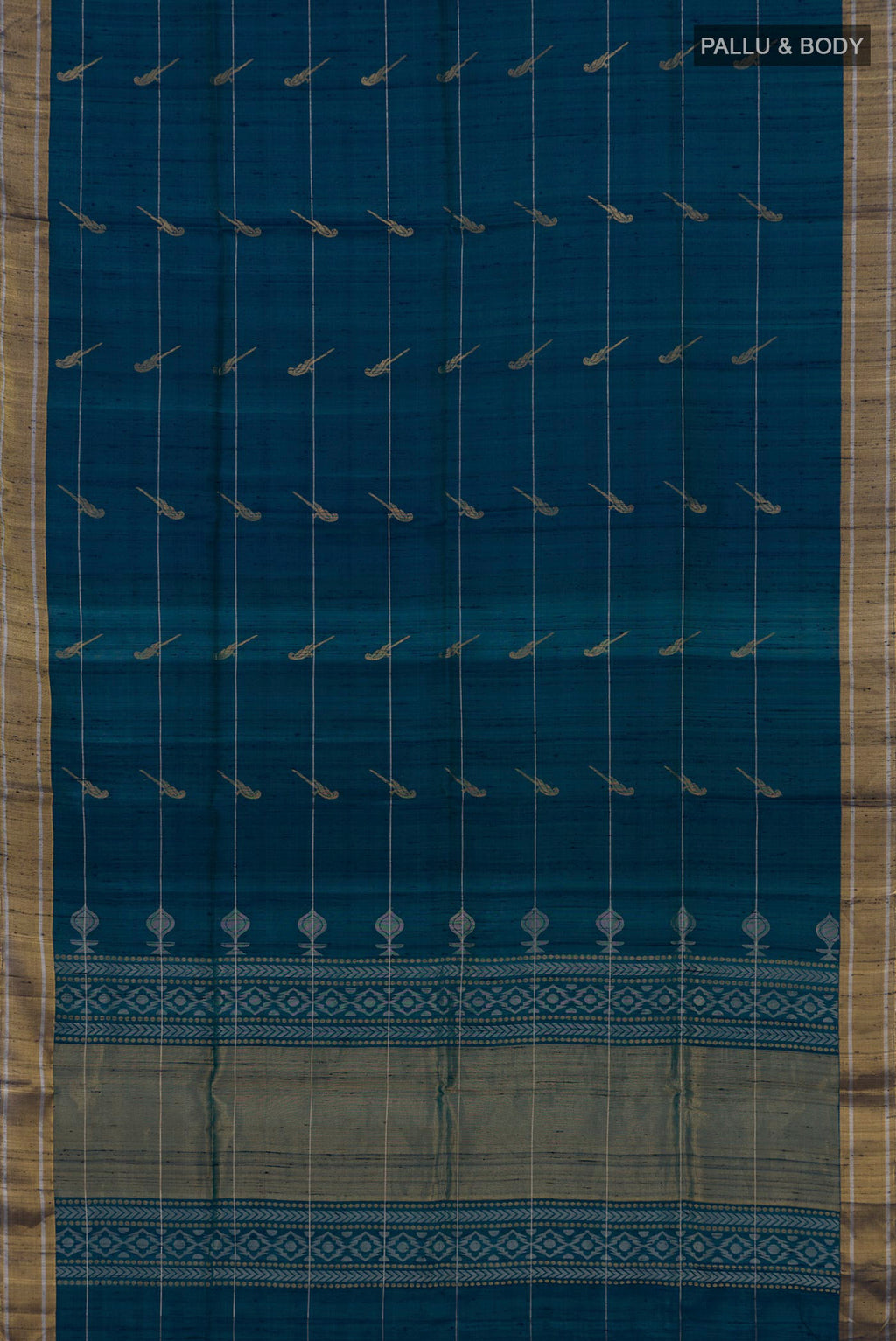 Flat view of Peacock Blue Soft Silk Saree with Zari Butta on the body and Zari Border. 