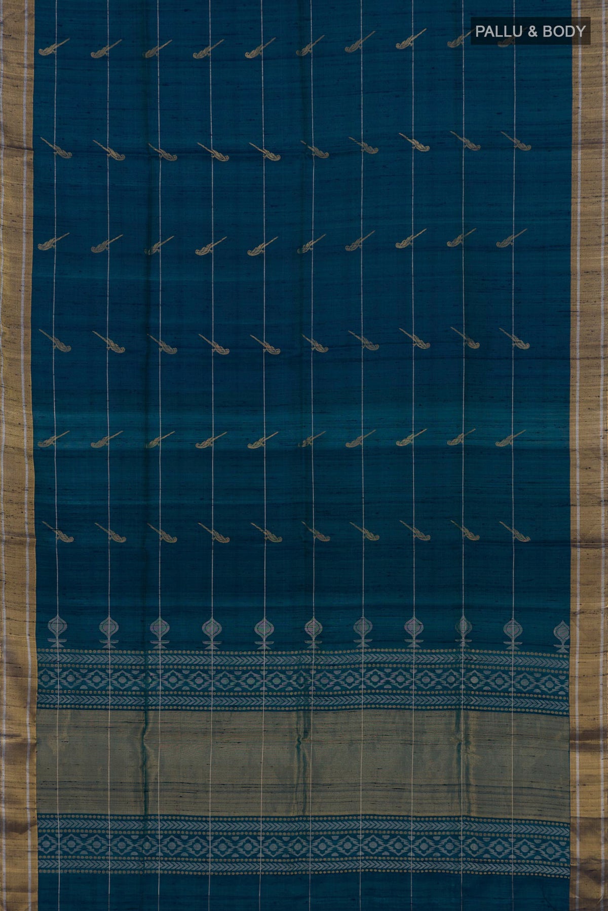 Flat view of Peacock Blue Soft Silk Saree with Zari Butta on the body and Zari Border. 