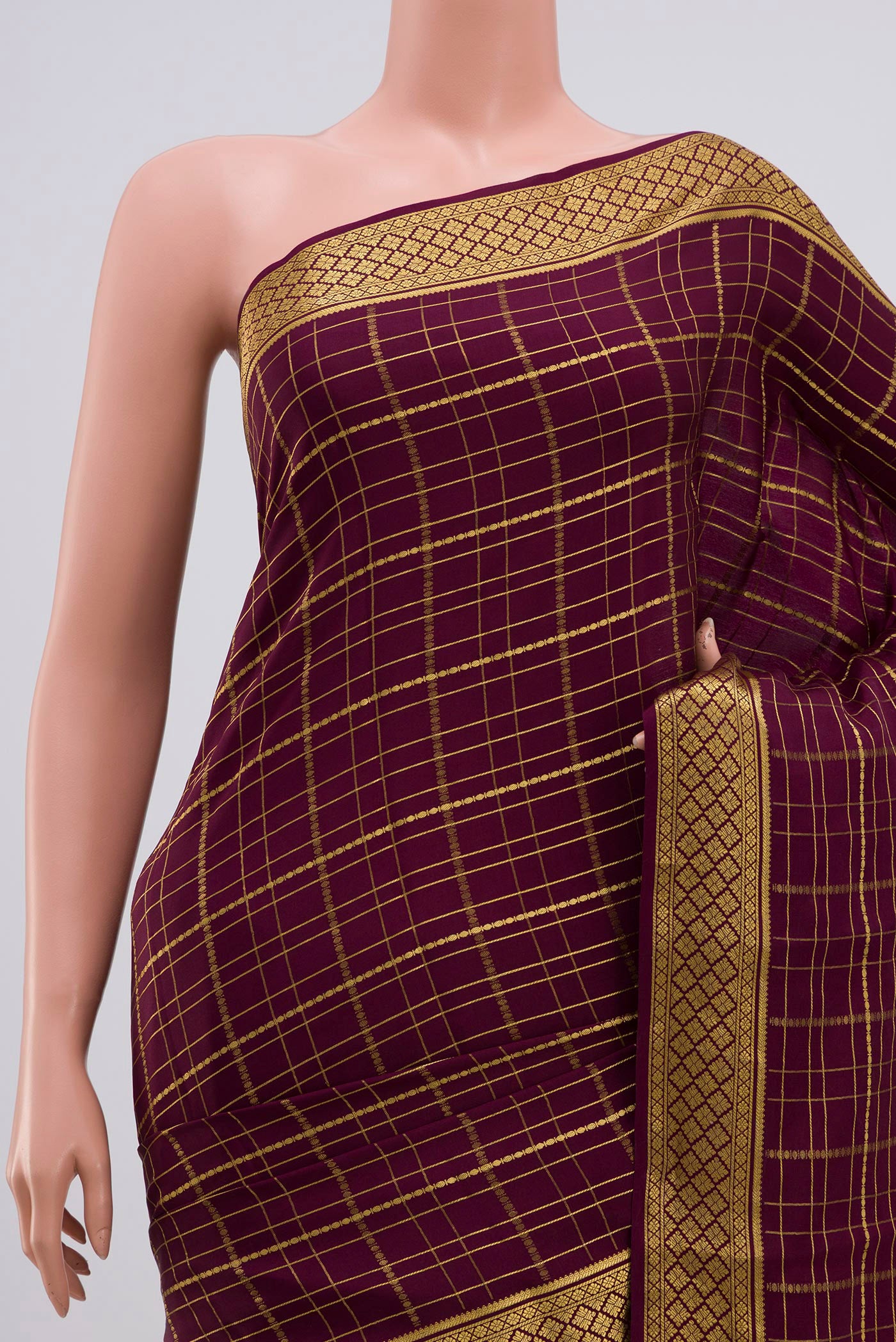 Border image of Purple Mysore Crepe Saree with Checked design on the body and Zari Border. 