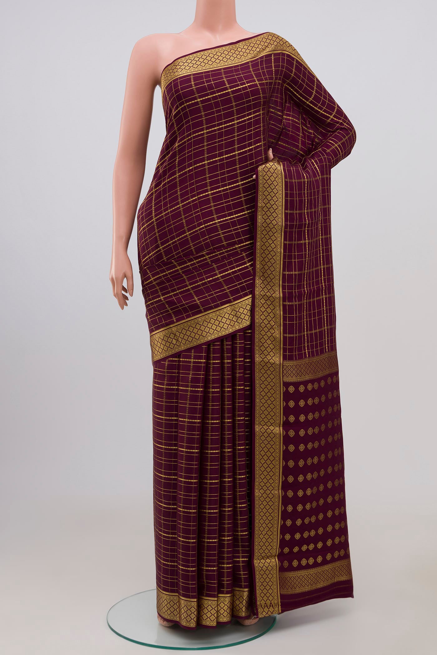 Purple Mysore Crepe Saree with Checked design on the body and Zari Border.  displayed on a mannequin