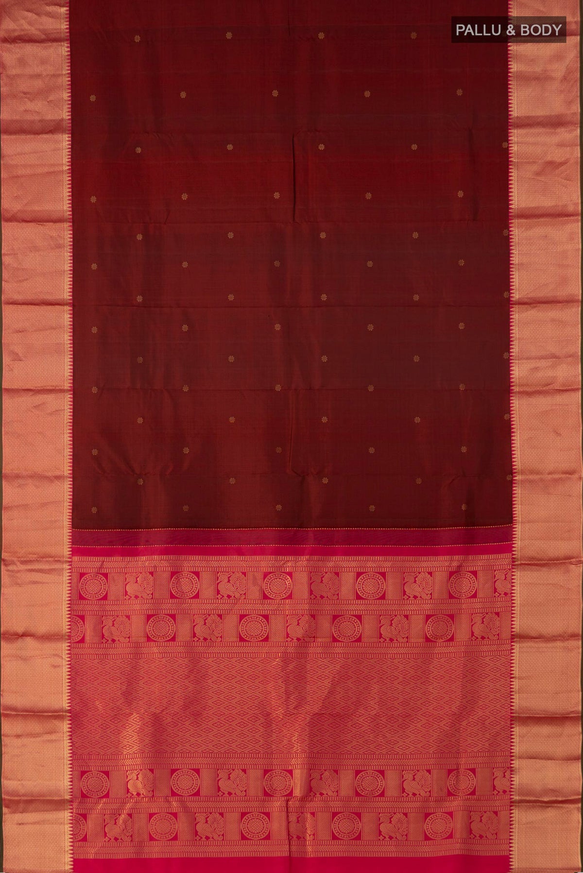 Flat view of Maroon Kanchipuram Saree with Zari Butta on the body and Zari Border. 