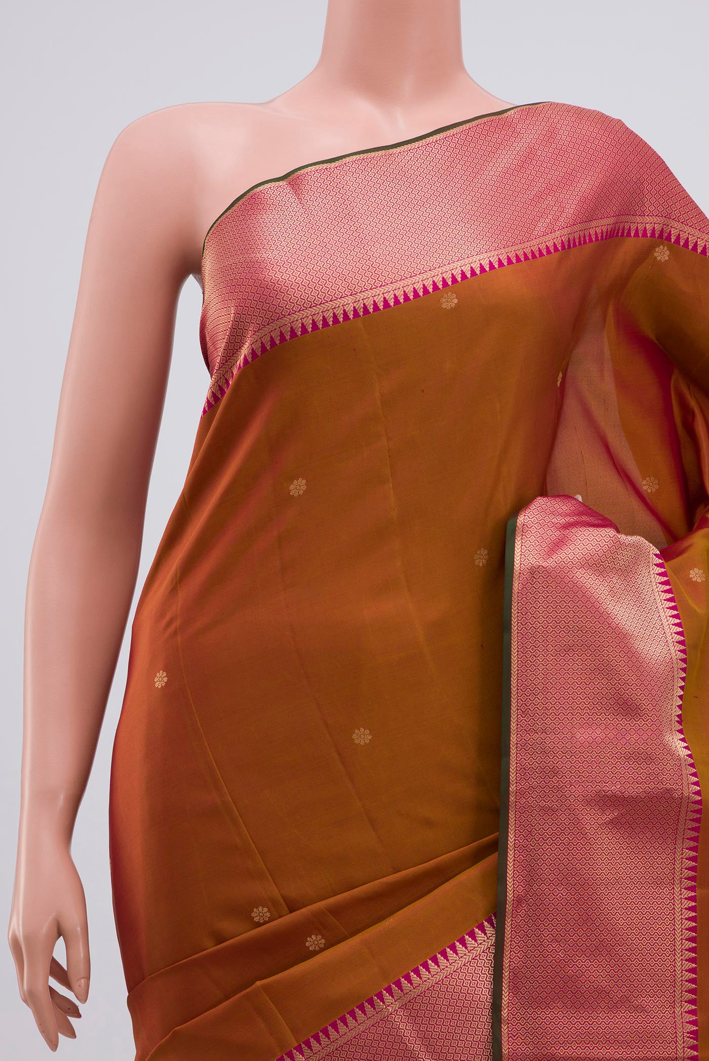 Border image of Mustard Kanchipuram Saree with Zari Butta on the body and Zari Border. 