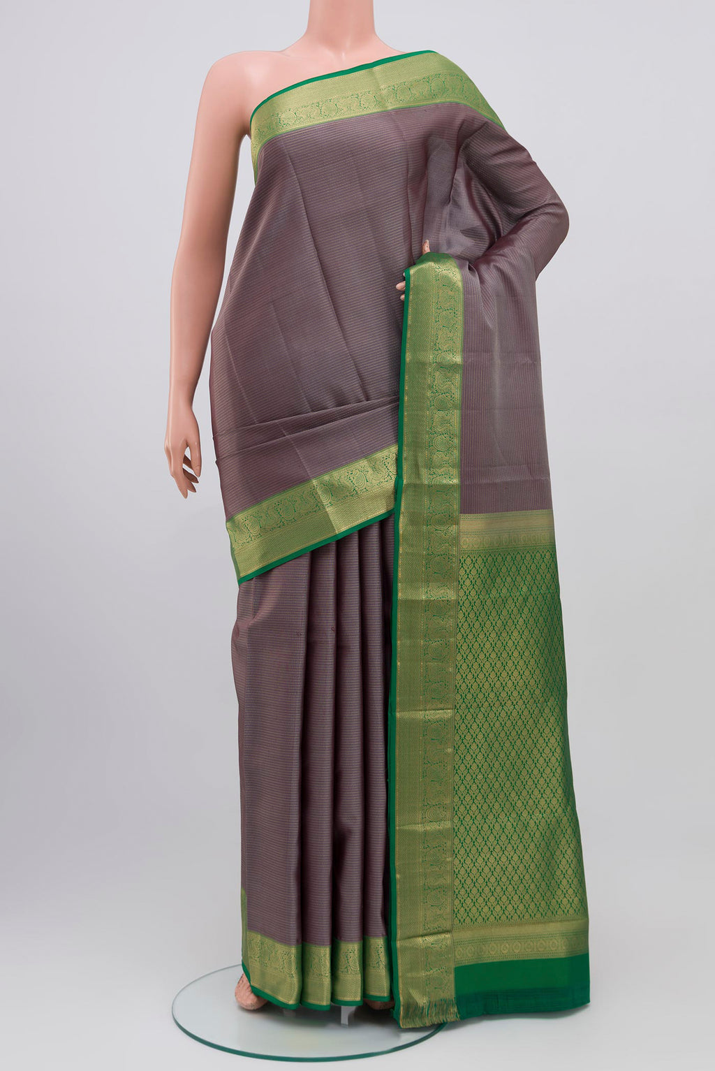 Grey Kanchipuram Saree with Stripes on the body and Zari Border.  displayed on a mannequin