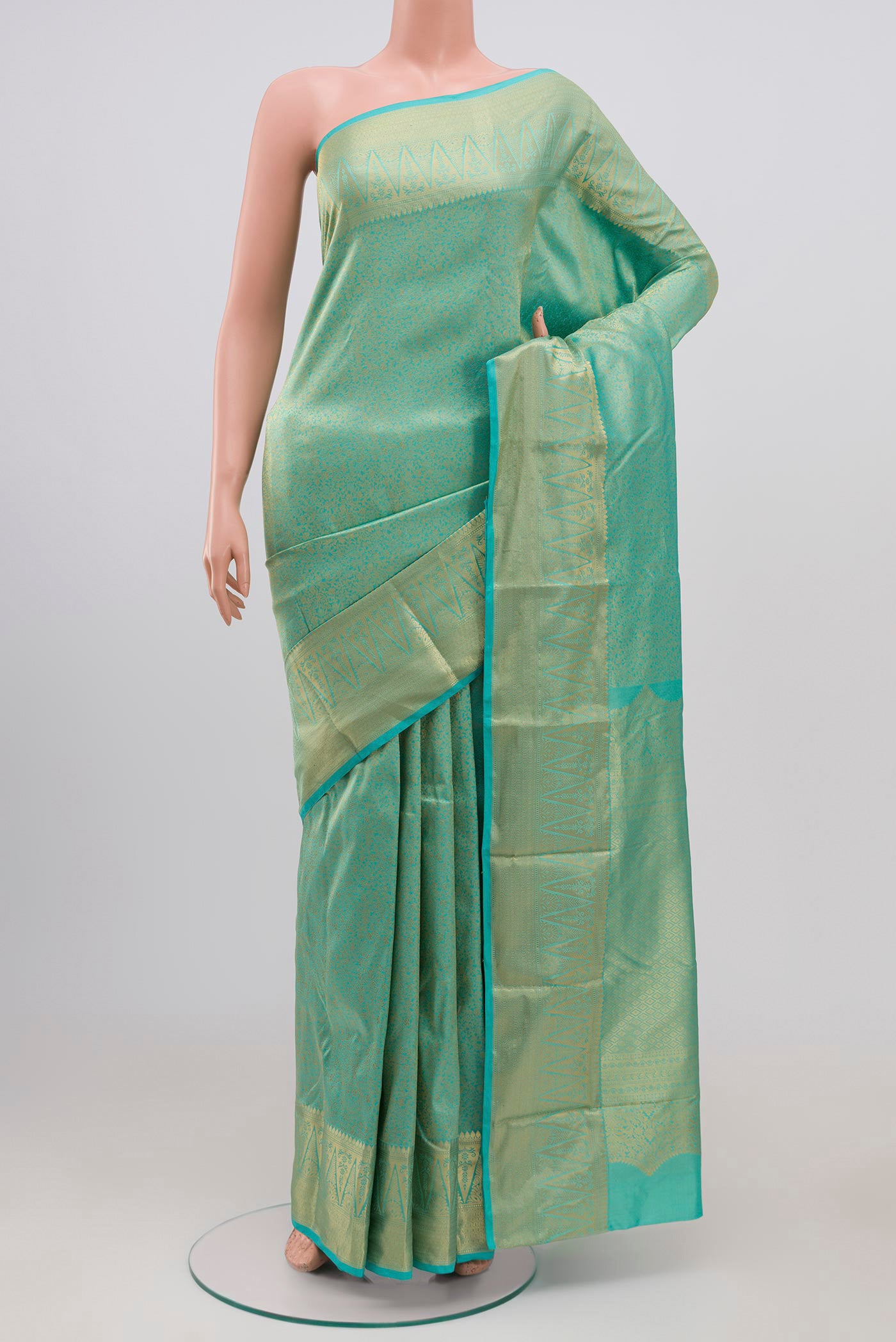 Sky Blue Bangalore Silk Saree with Zari Brocade on the body and Zari Border.  displayed on a mannequin