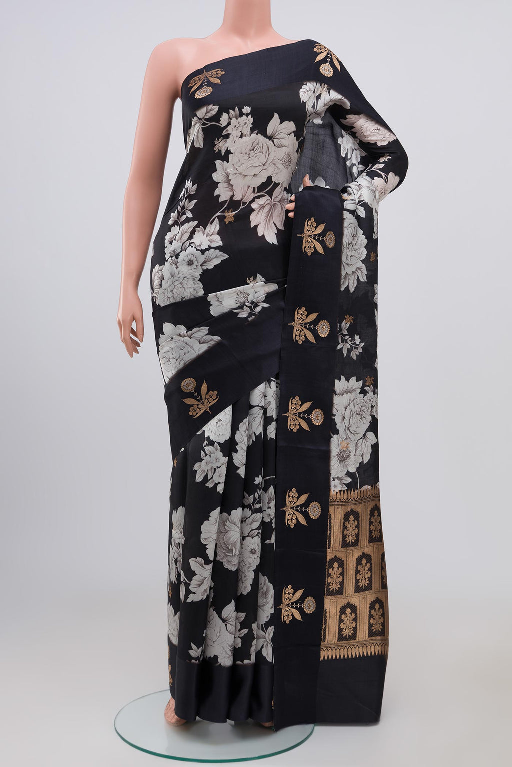 Black Banarasi Katan Silk Saree with Floral Print on the body and Fancy Border.  displayed on a mannequin