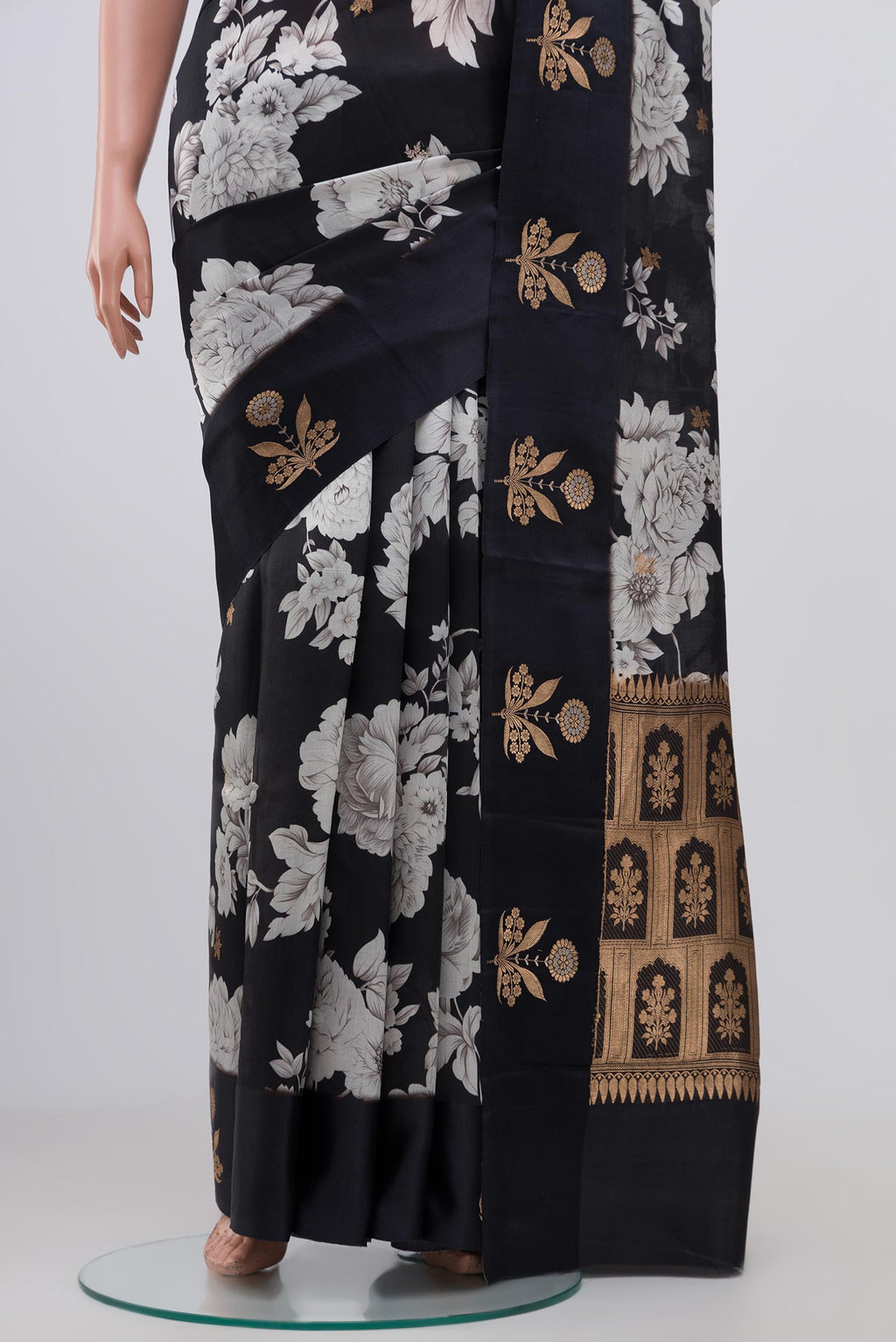 Pleats and pallu of Black Banarasi Katan Silk Saree with Floral Print on the body and Fancy Border. 