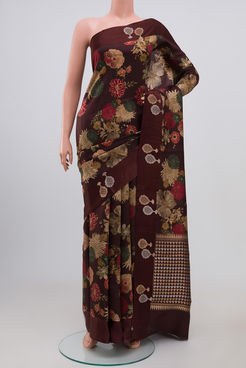 Brown Banarasi Saree with Fancy on the body and Fancy Border.  displayed on a mannequin