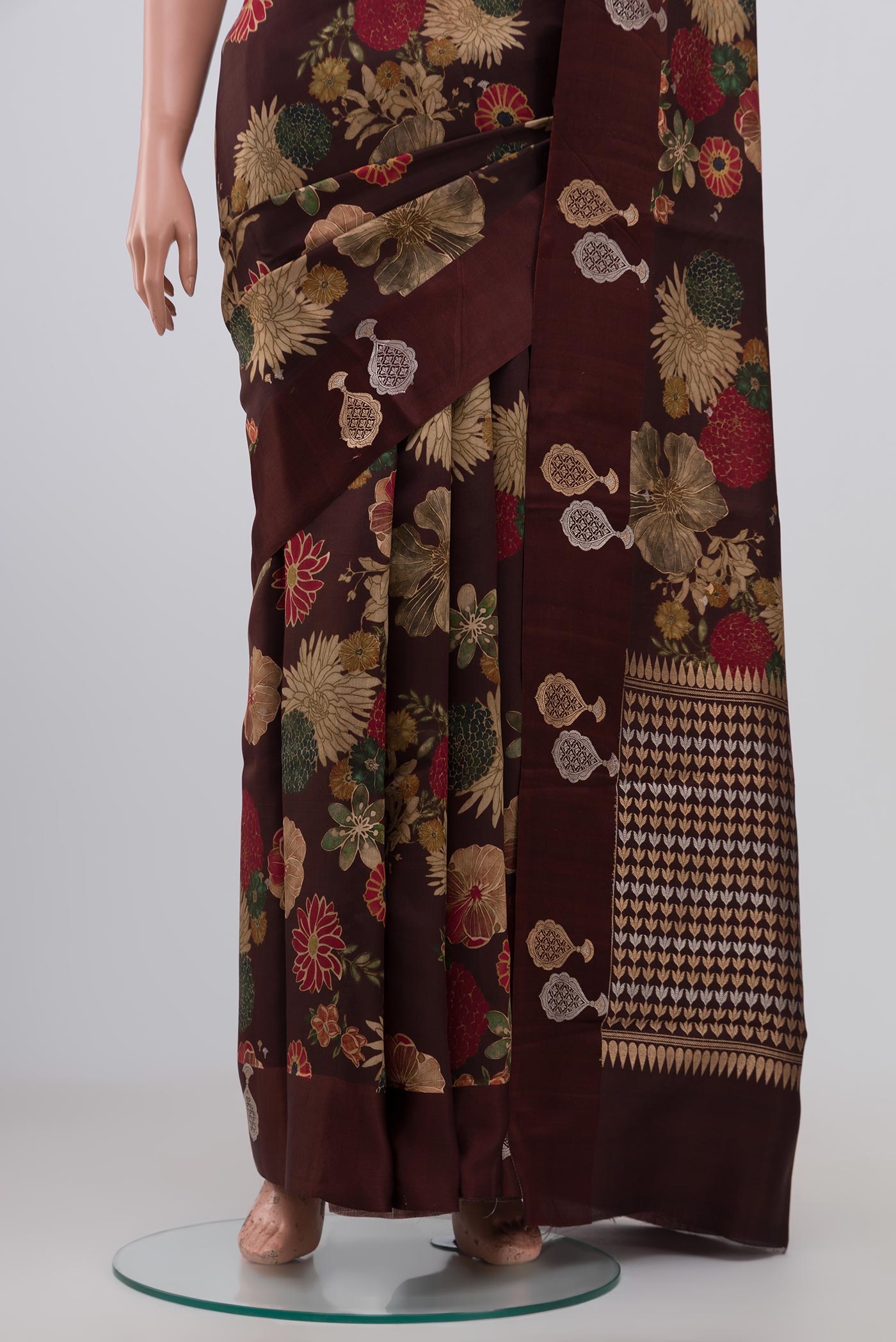 Pleats and pallu of Brown Banarasi Saree with Fancy on the body and Fancy Border. 