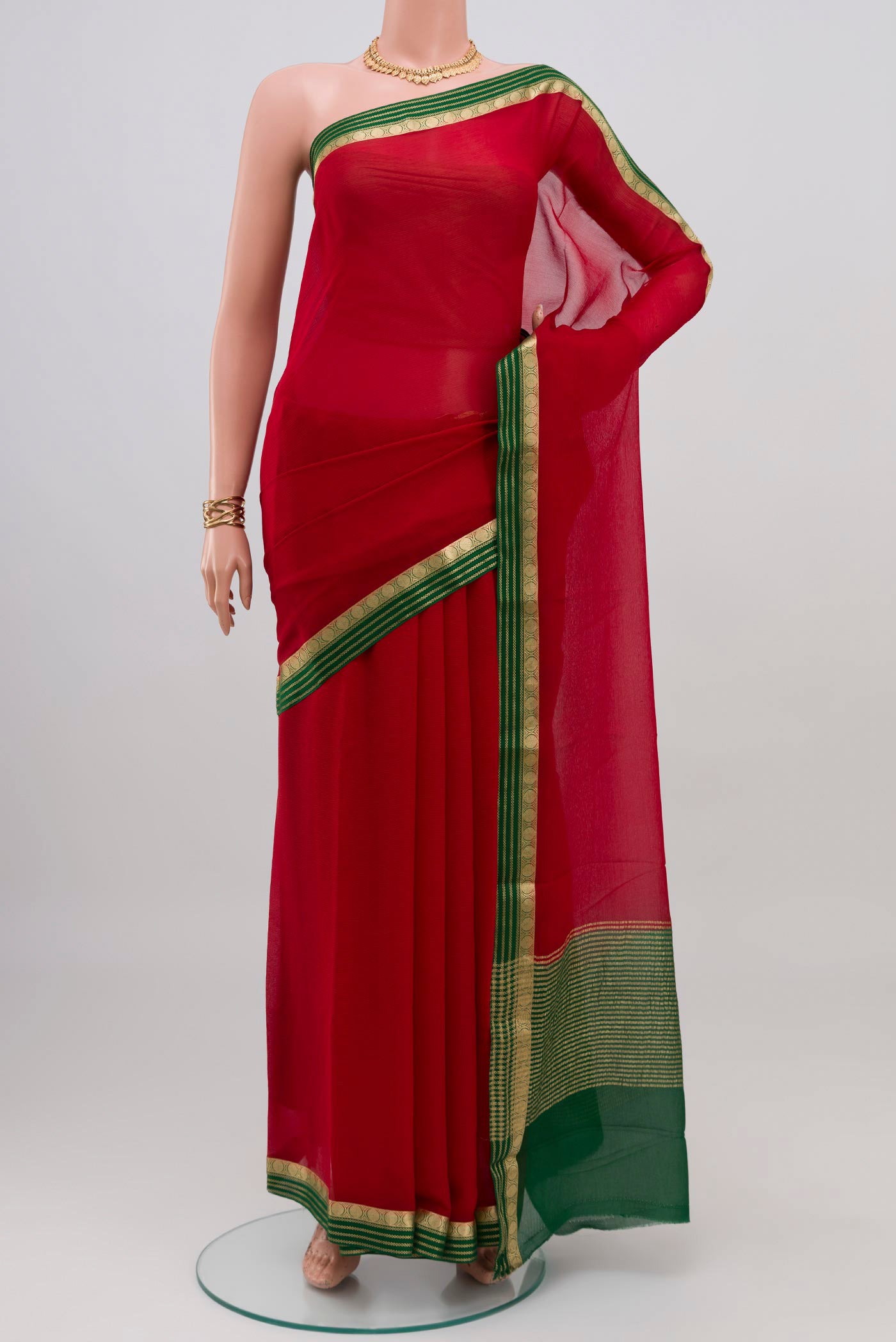 Red Mysore Chiffon Saree with Plain Body and Zari Border.  displayed on a mannequin