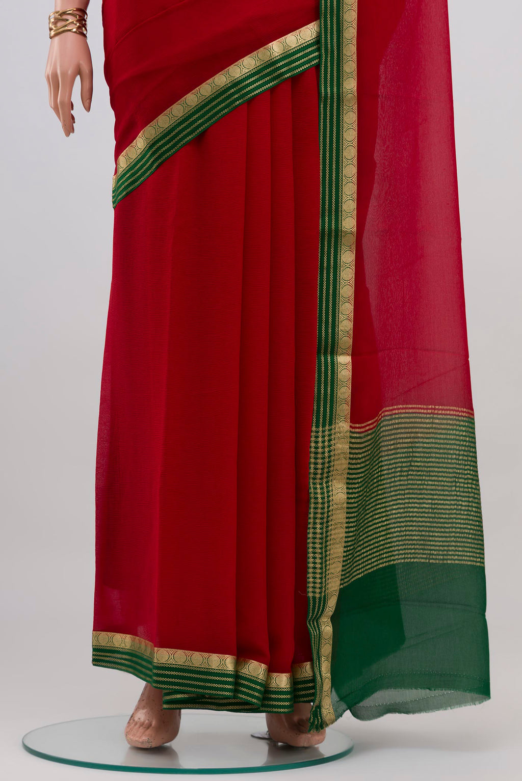 Pleats and pallu of Red Mysore Chiffon Saree with Plain Body and Zari Border. 