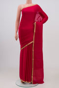 Pink Crepe Saree with Jacquard design on the body and Zari Border.  displayed on a mannequin