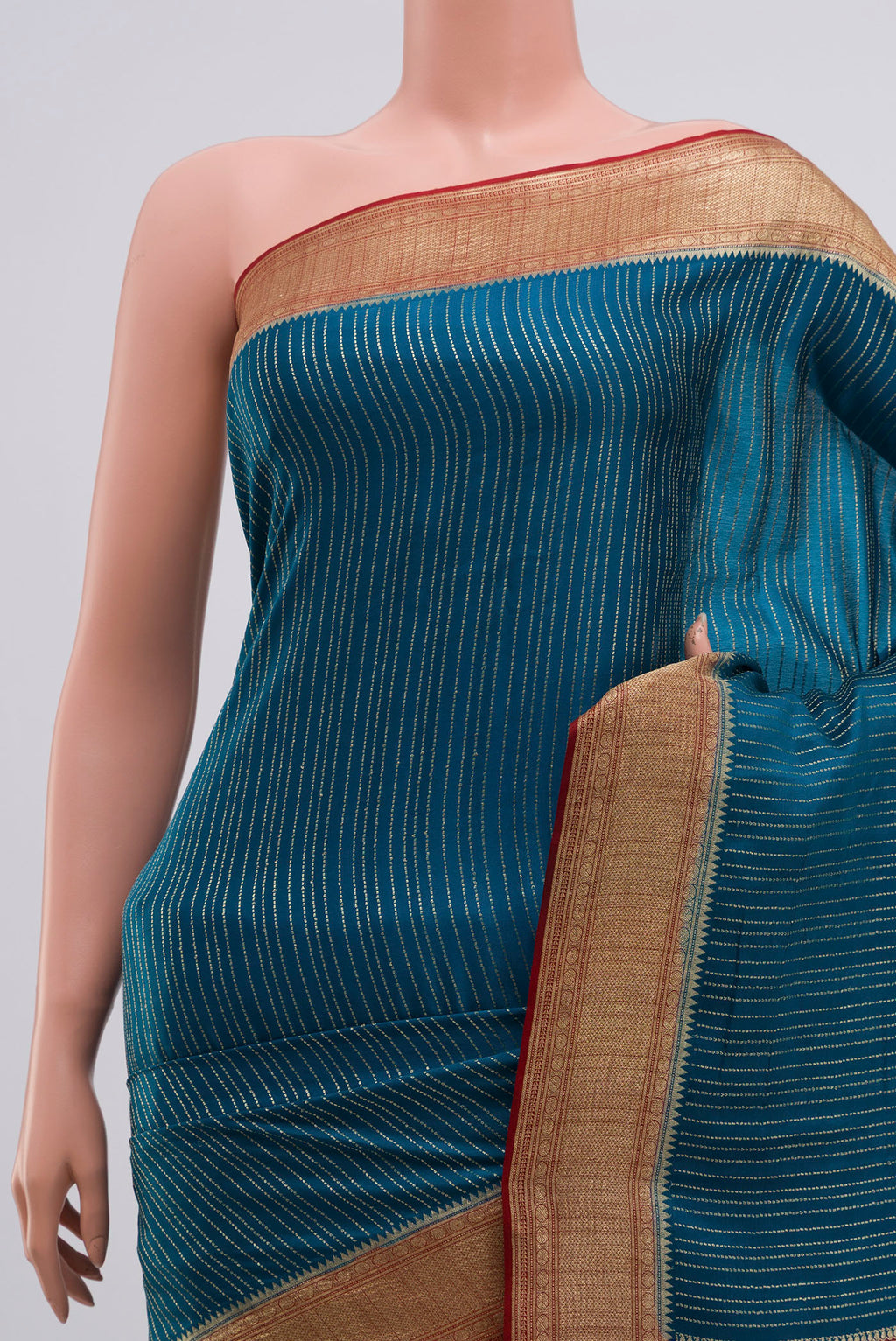 Border image of Blue Mysore Crepe Saree with Stripes on the body and Zari Border. 
