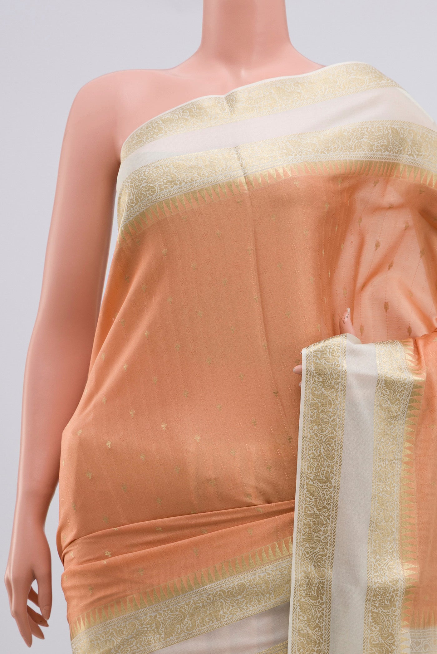 Border image of Peach Mysore Crepe Saree with Jacquard With Zari Butta on the body and Zari Border. 