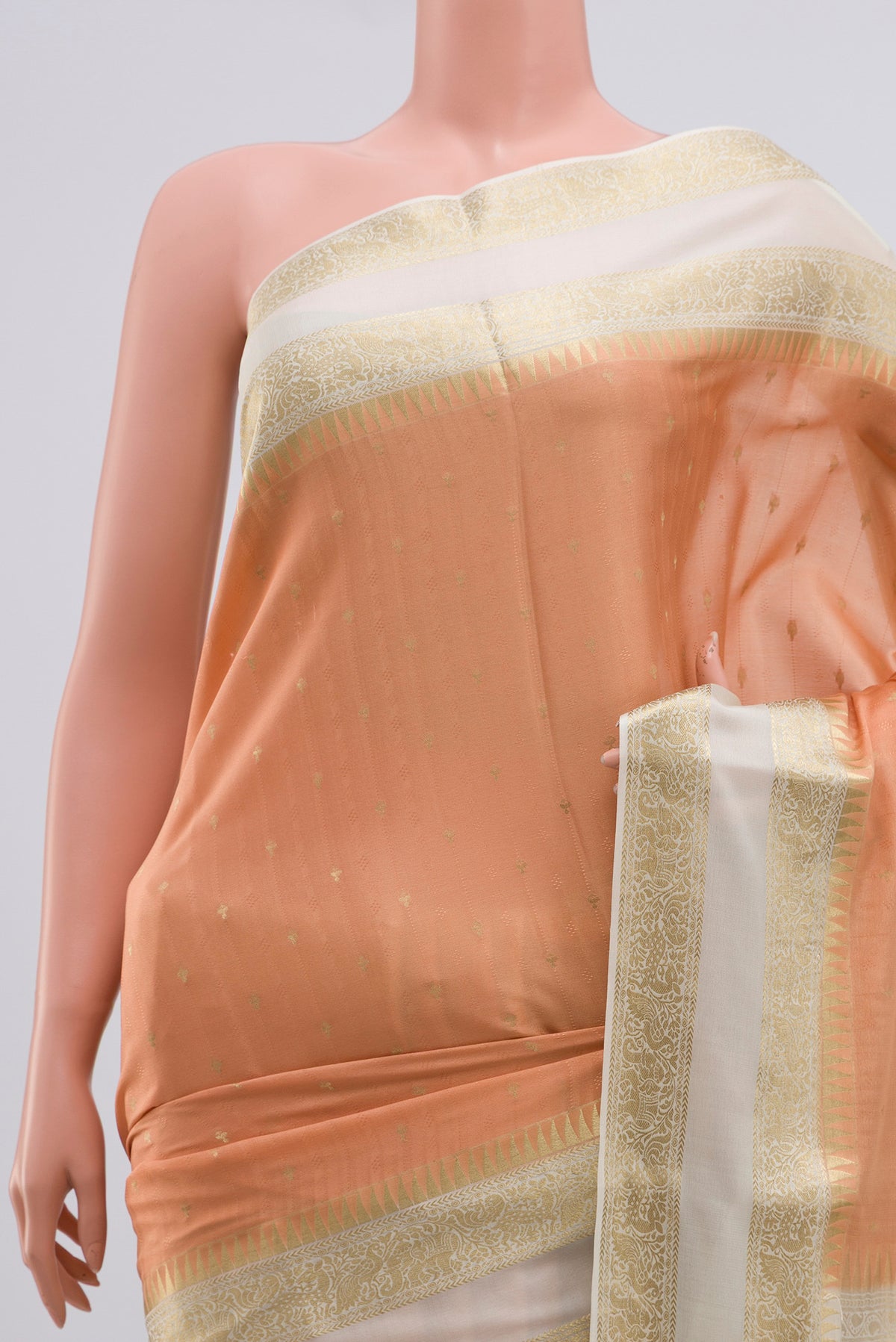 Border image of Peach Mysore Crepe Saree with Jacquard With Zari Butta on the body and Zari Border. 