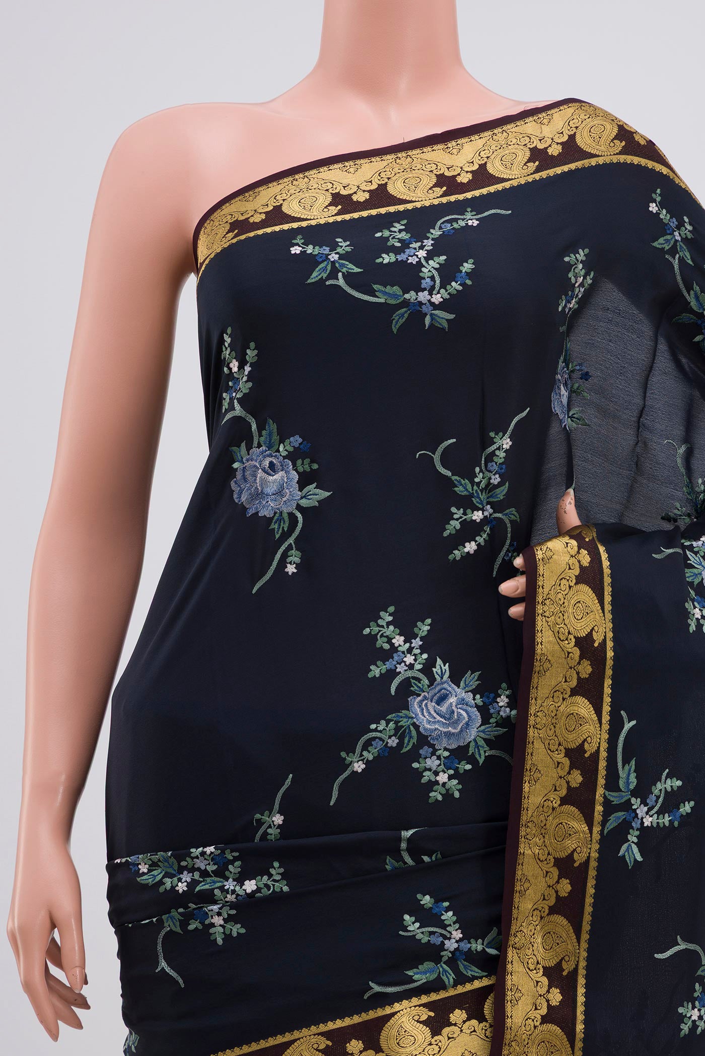 Border image of Blue Mysore Crepe Saree with Fancy on the body and Zari Border. 