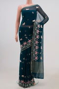 Blue Chiffon Saree with Embroidery on the body and Fancy Border.  displayed on a mannequin