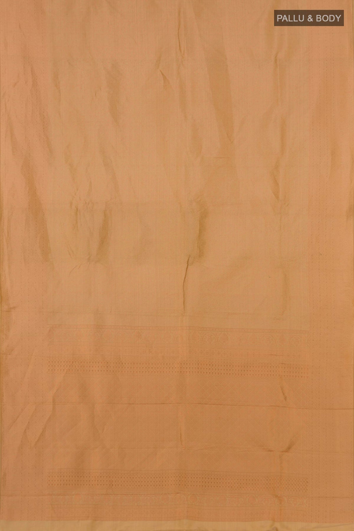 Flat view of Cream Kanchipuram Silk Saree with Zari Brocade on the body and Zari Border. 